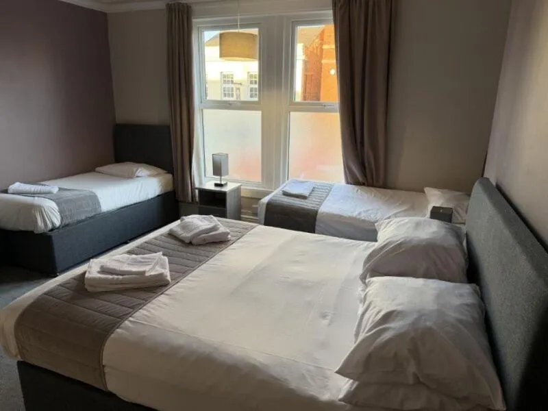 Bed in The Avenue Hotel