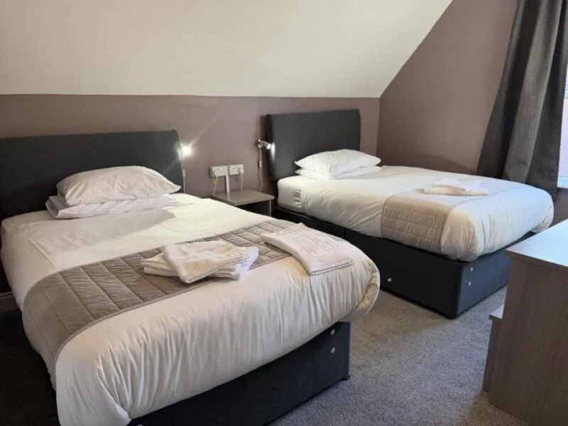 Bed in The Avenue Hotel