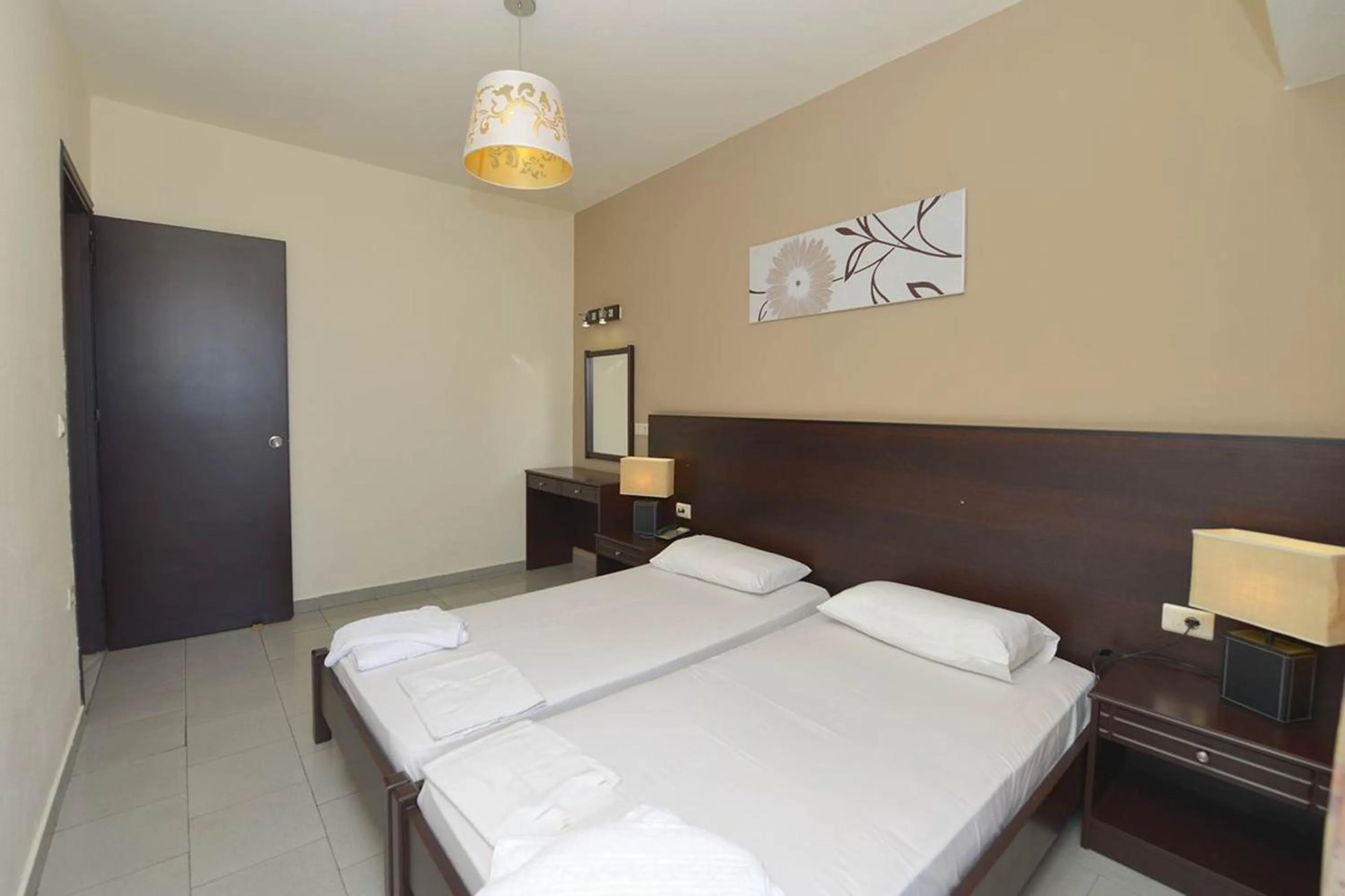 Bedroom in Ialysos City Hotel