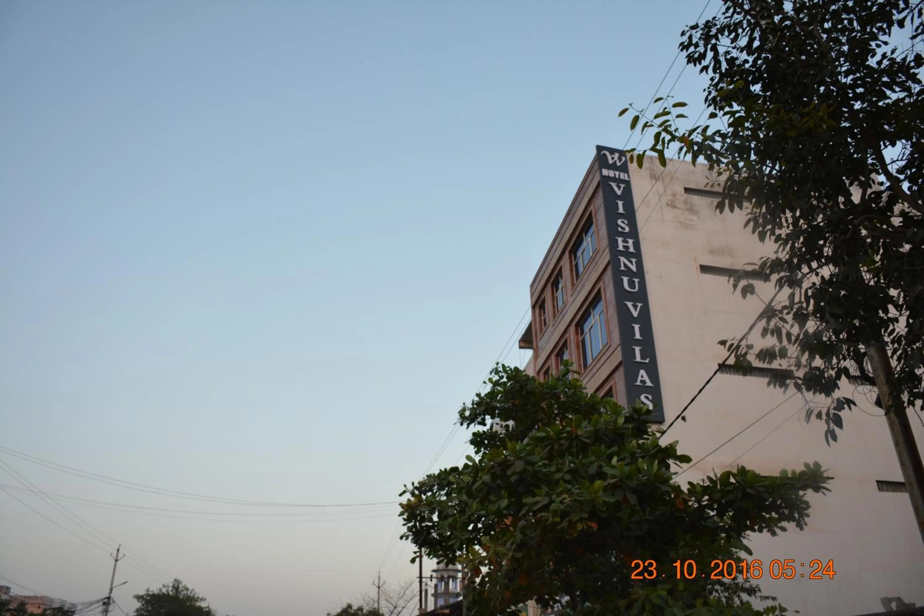 Property logo or sign in Hotel Vishnu Vilas