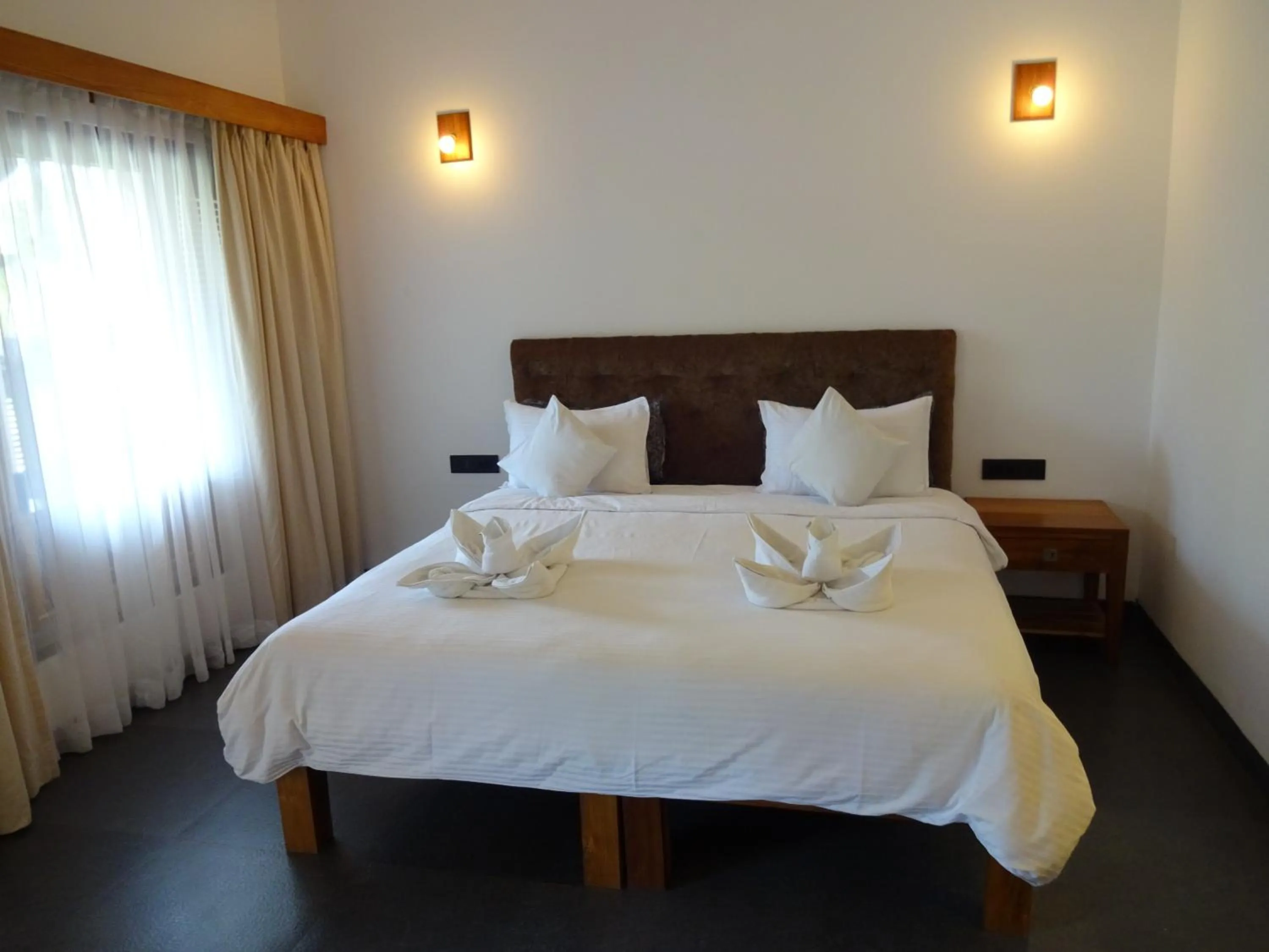 Bed in Dunhill Beach Resort