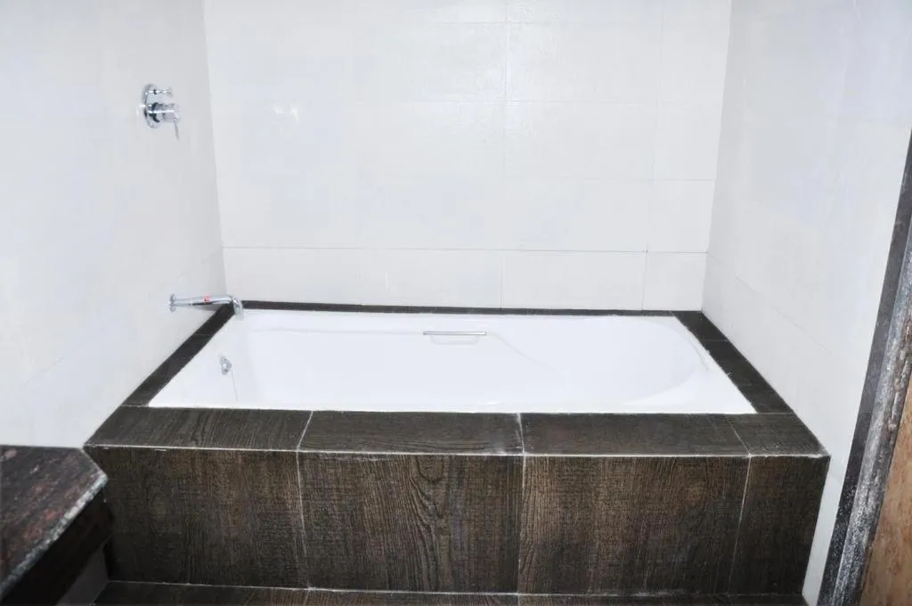 Bathroom, Bed in Hotel Sai Shubham