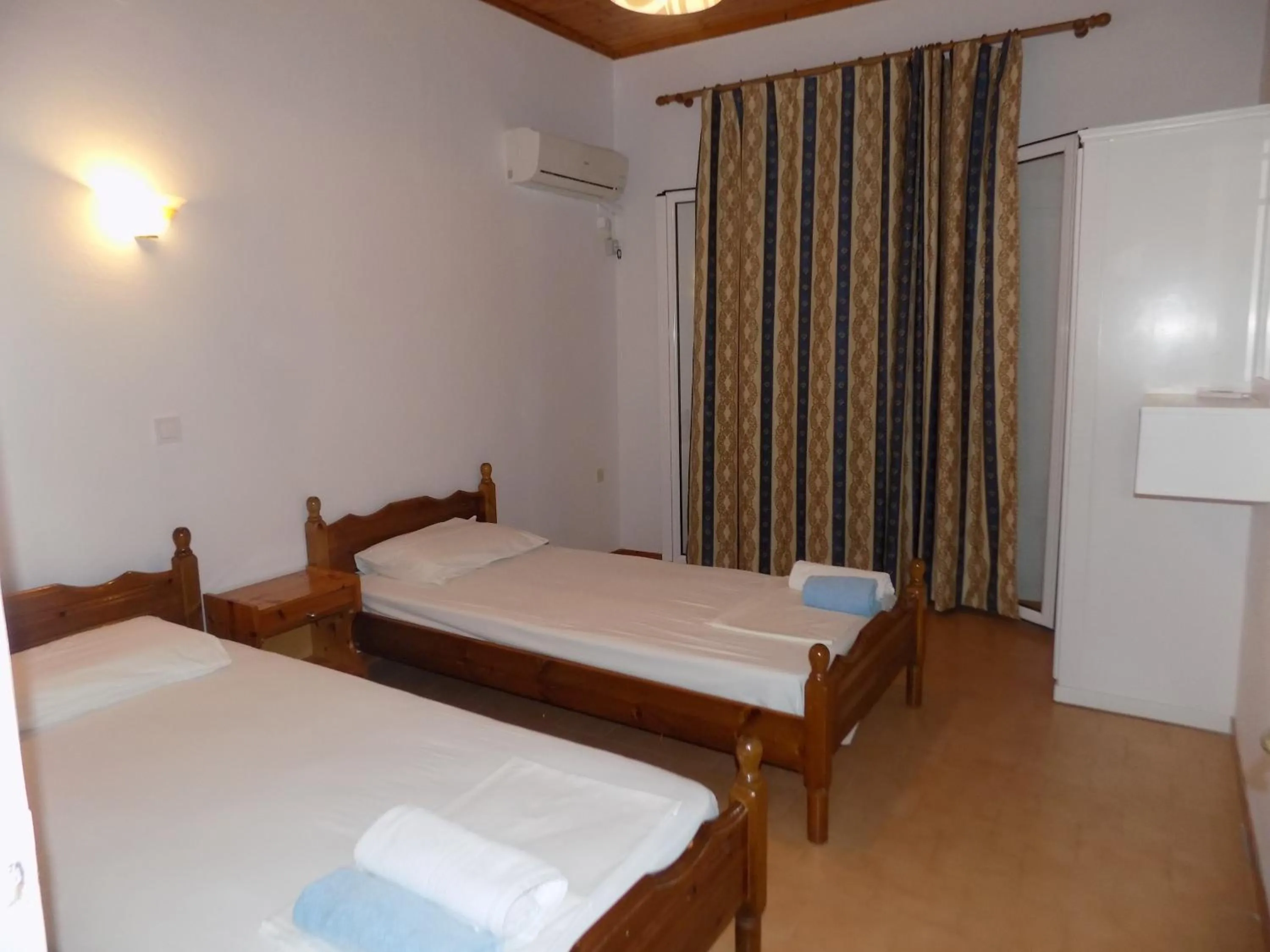 Bed in Apartments Elli - Nikos