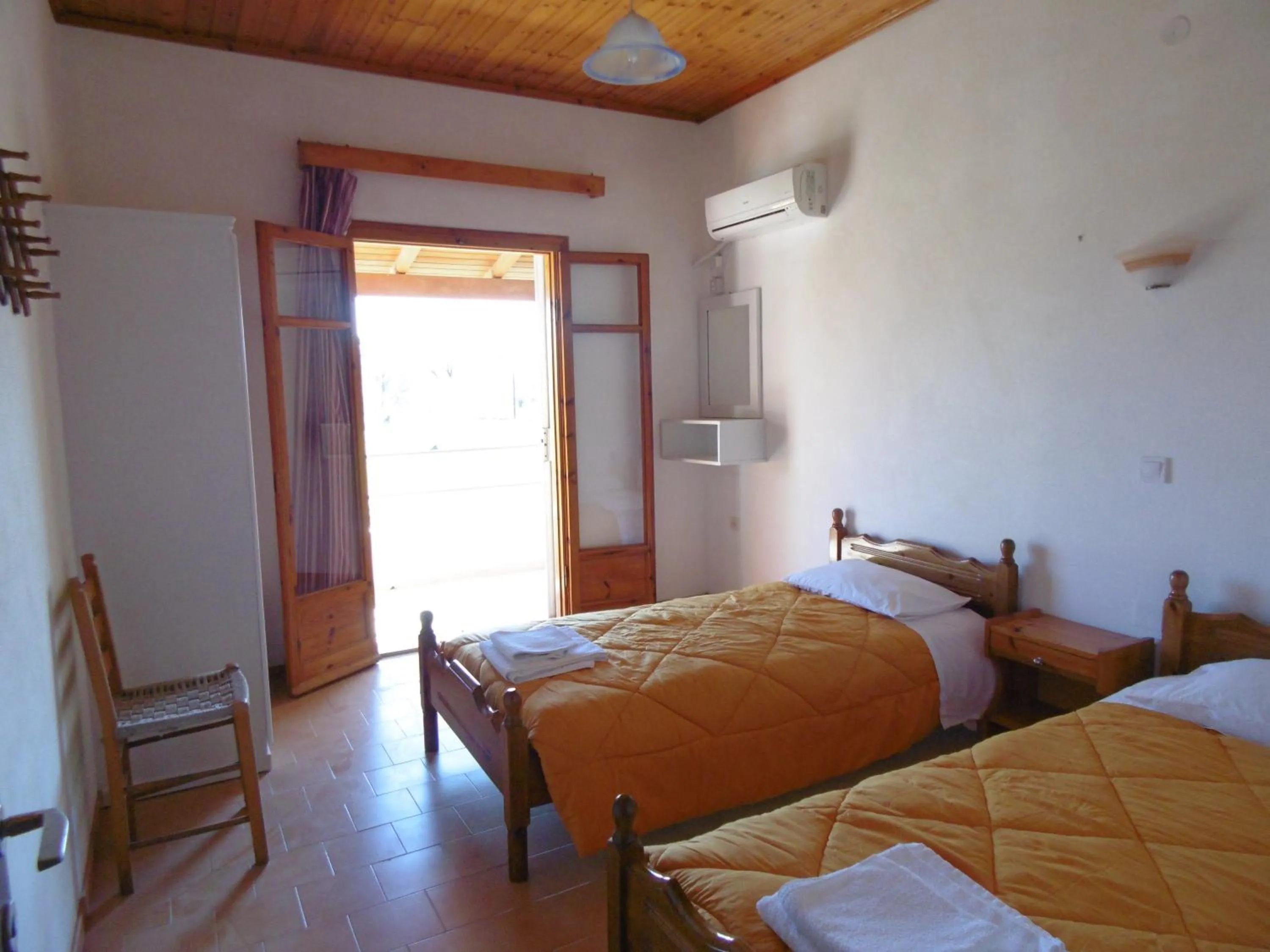 Bed in Apartments Elli - Nikos