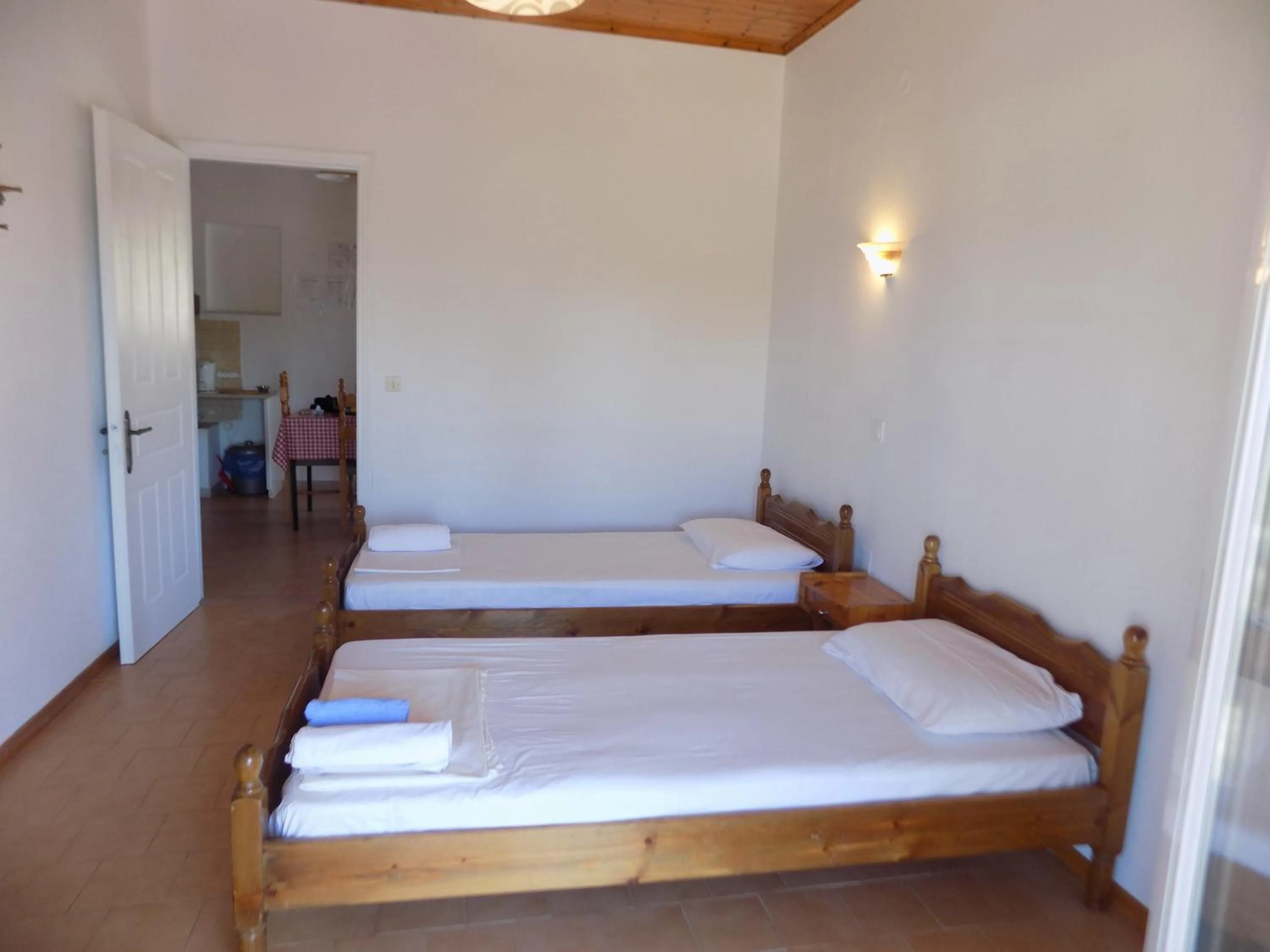 Bed in Apartments Elli - Nikos