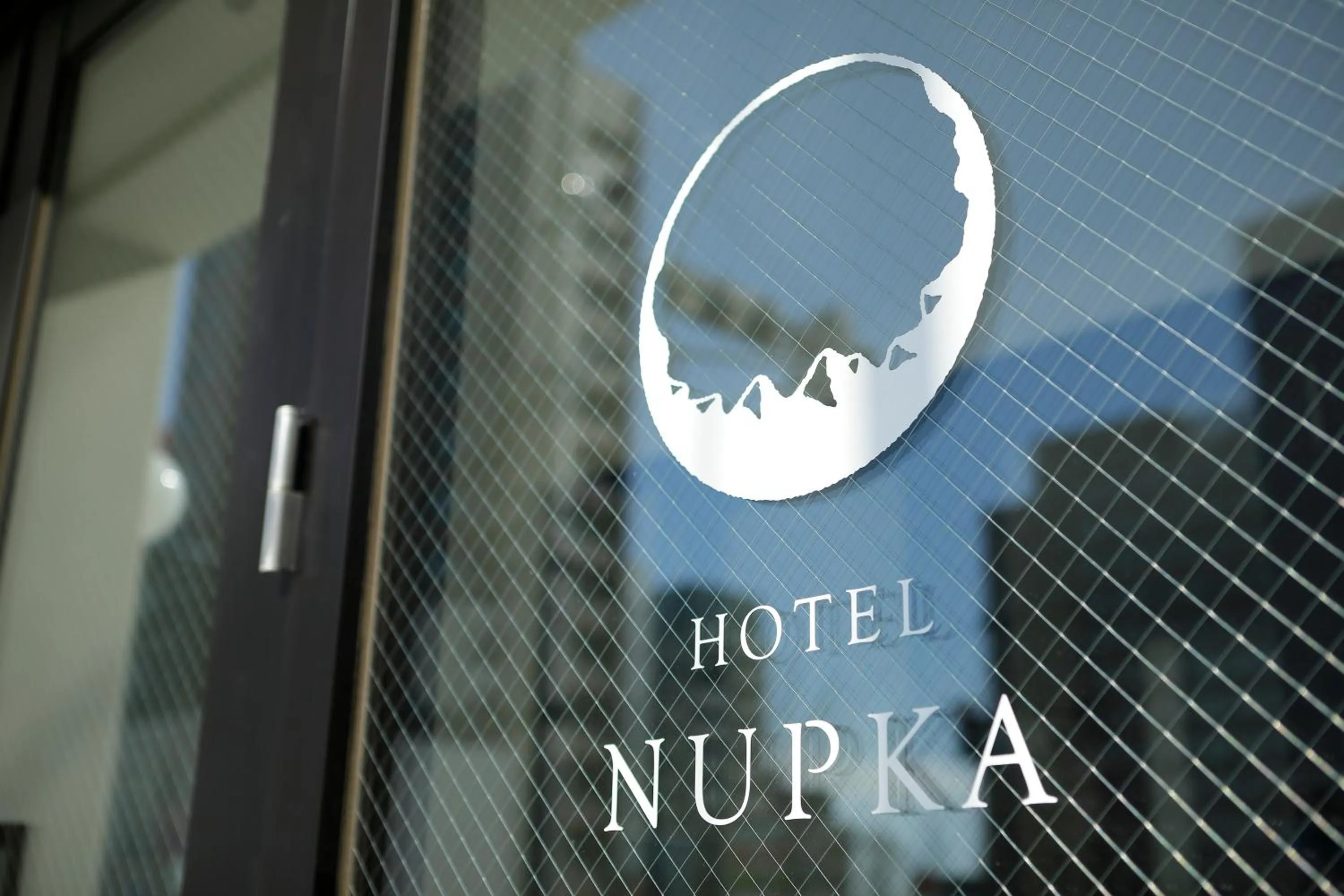 Property logo or sign in Hotel Nupka
