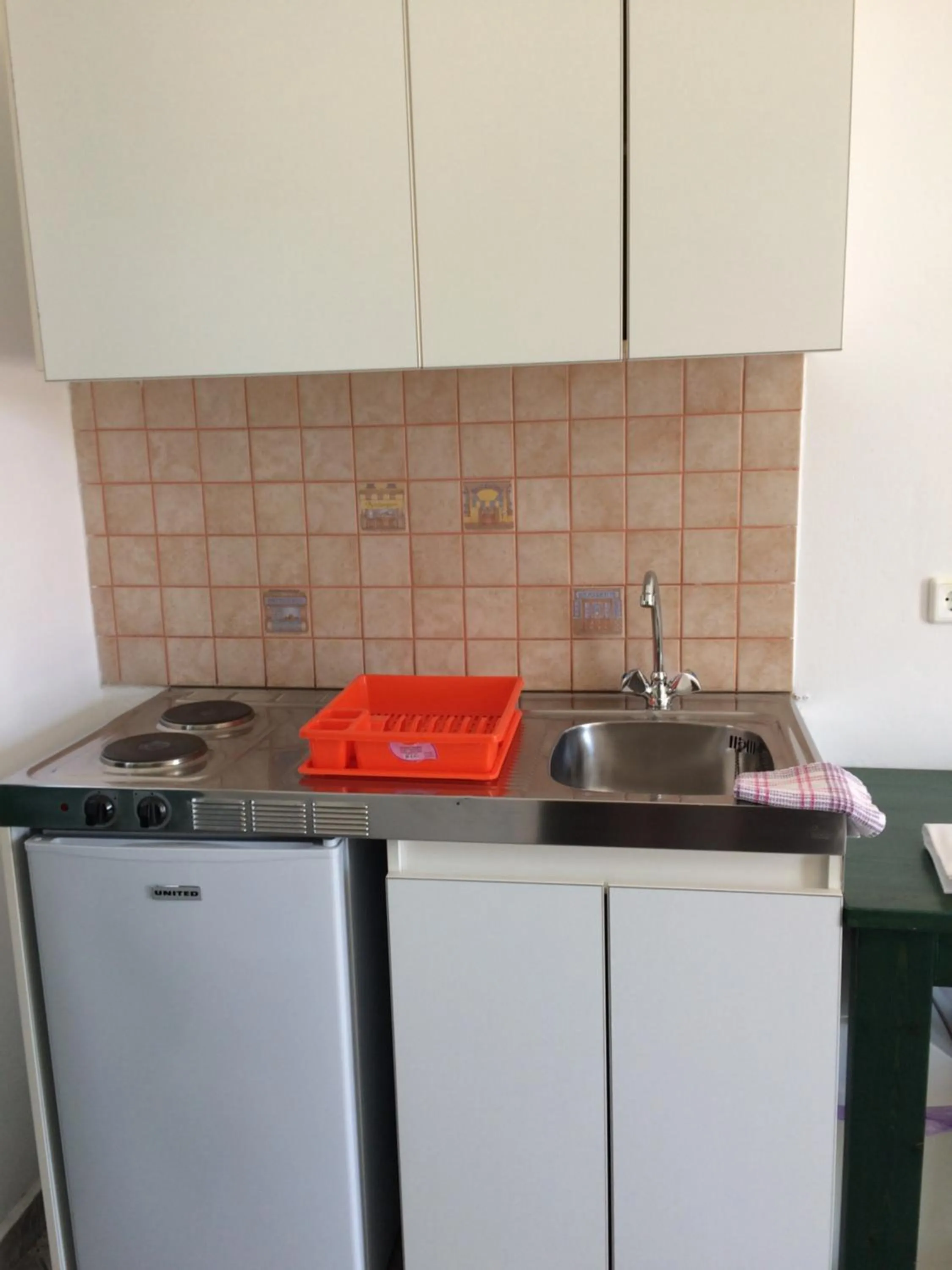 Kitchen or kitchenette in Koukounaries Studios