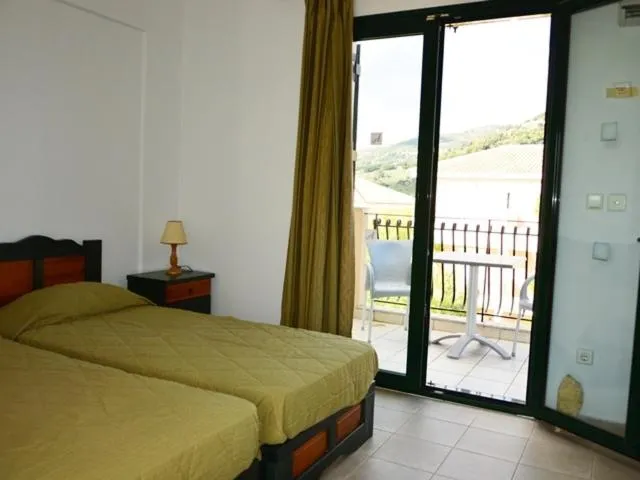 Mountain view, Bed in Koukounaries Studios
