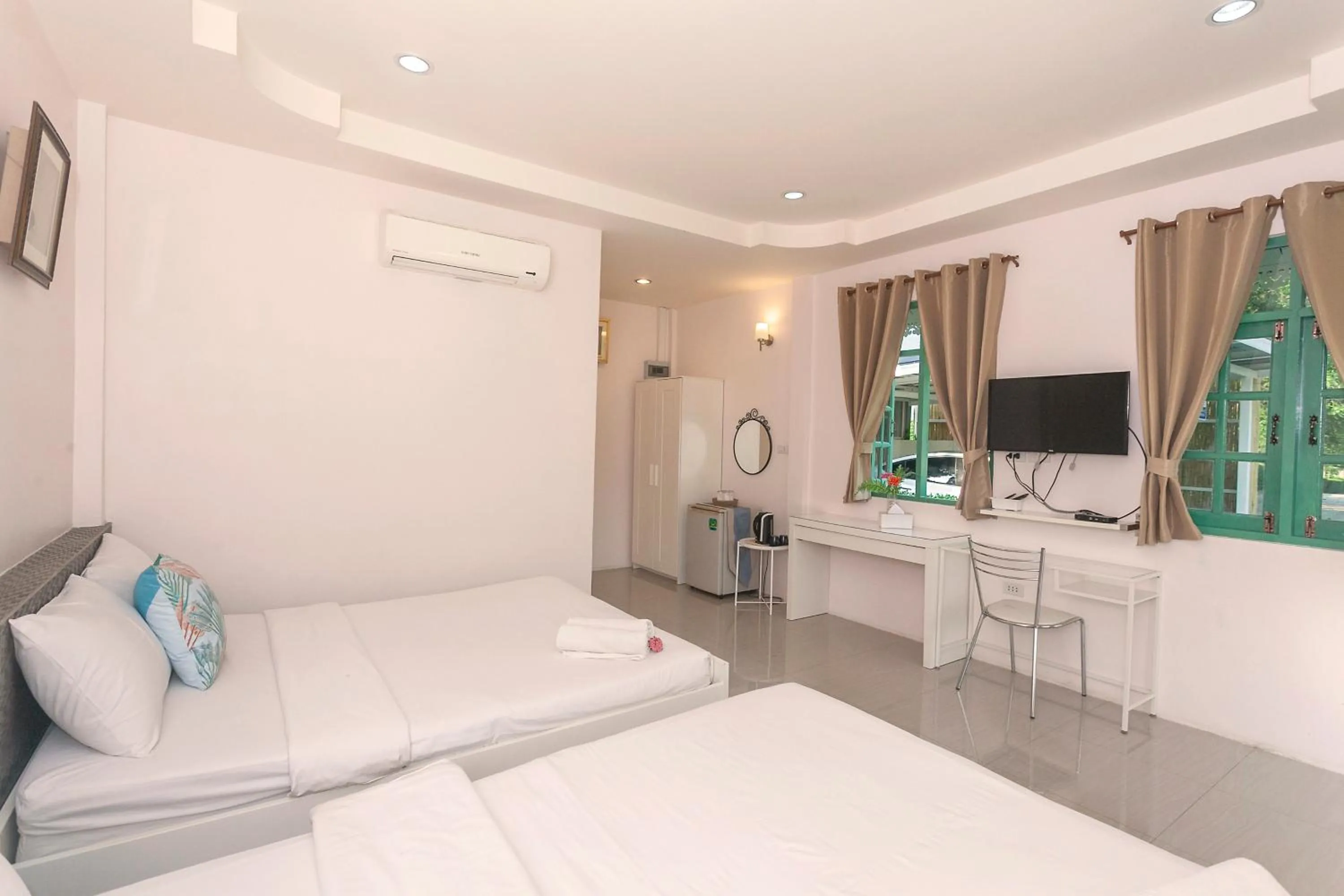 Bed in Baanpufa Resort