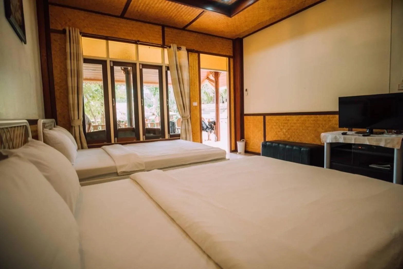 Bed in Baanpufa Resort