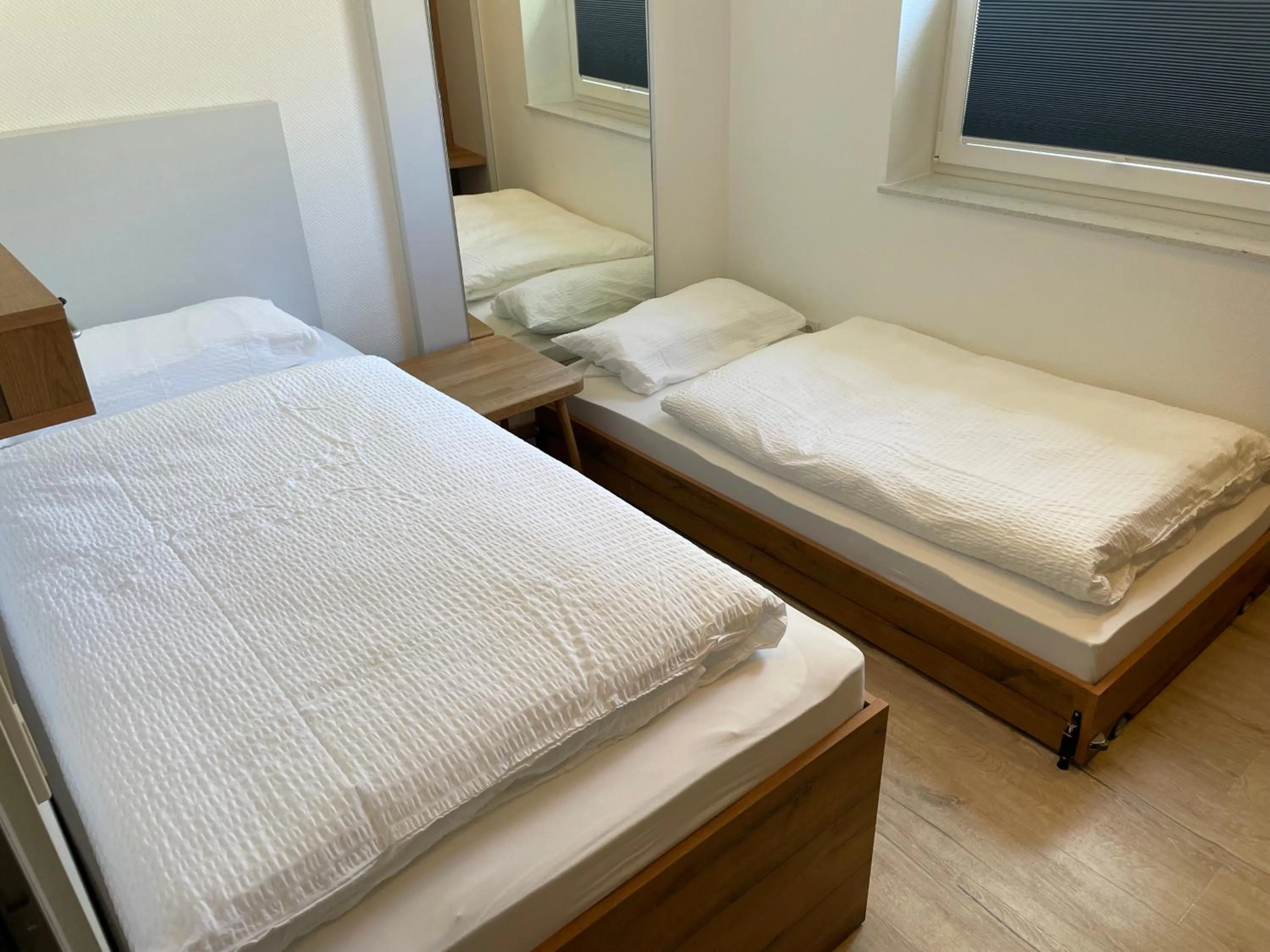 Photo of the whole room, Bed in Gästehaus Janßen