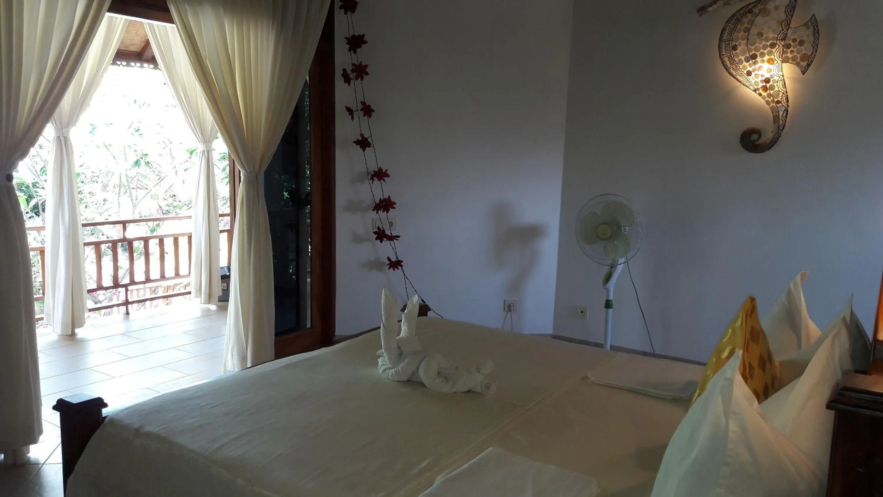 Bed in Villa Jakaranda and Villa Marakuya