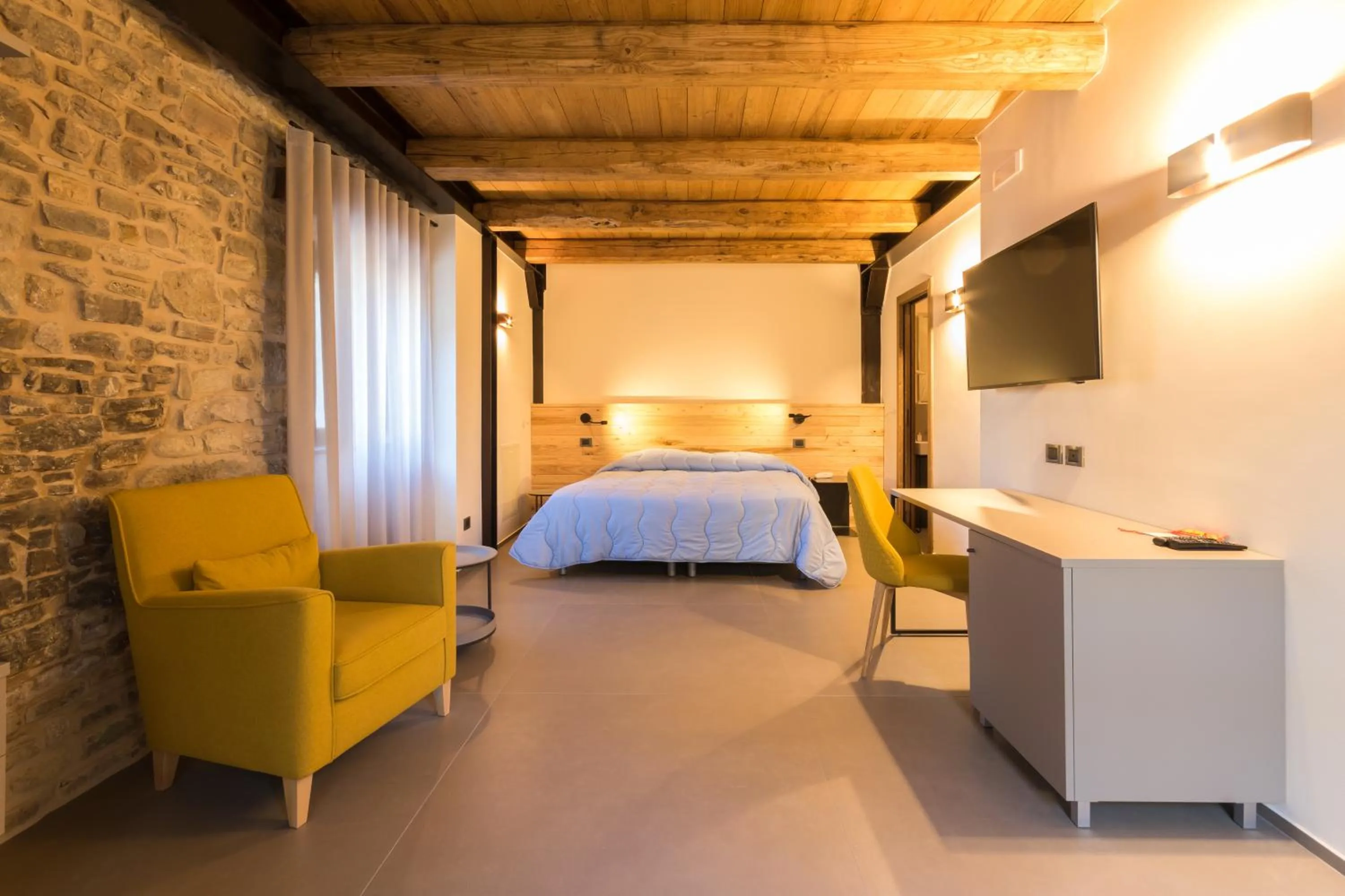 Bed in Borgotufi Albergo Diffuso