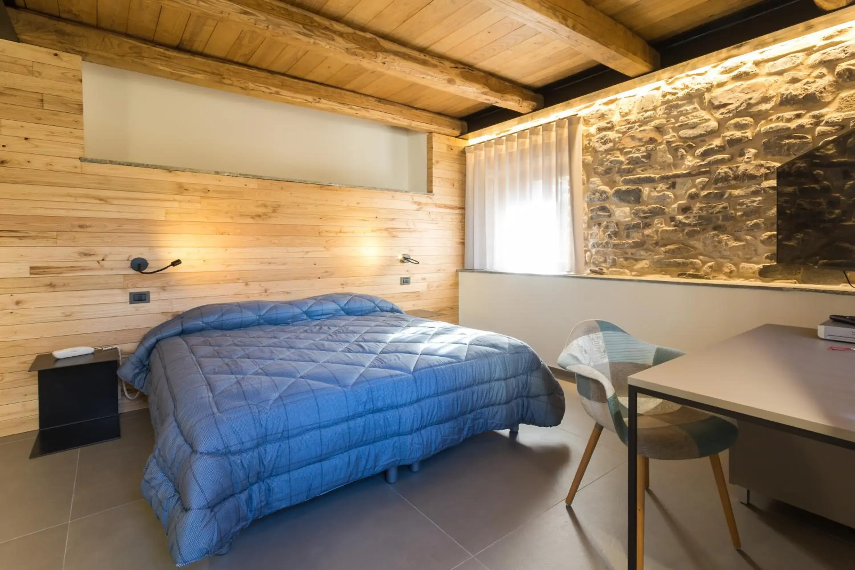 Executive Family Room in Borgotufi Albergo Diffuso Executive Family Room in Borgotufi Albergo Diffuso