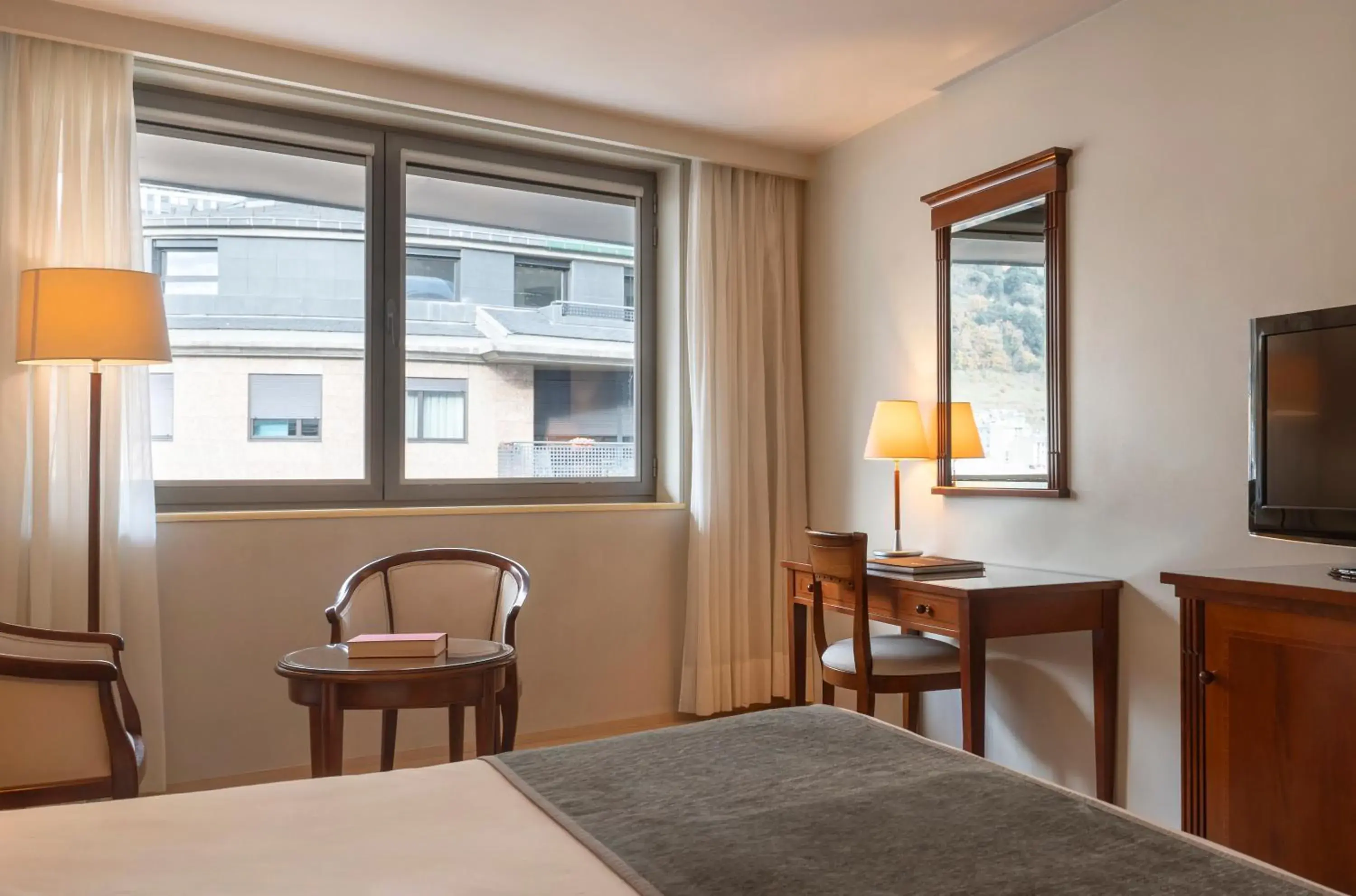 Seating area, Bed in Hesperia Andorra Seating area, Bed in Hesperia Andorra