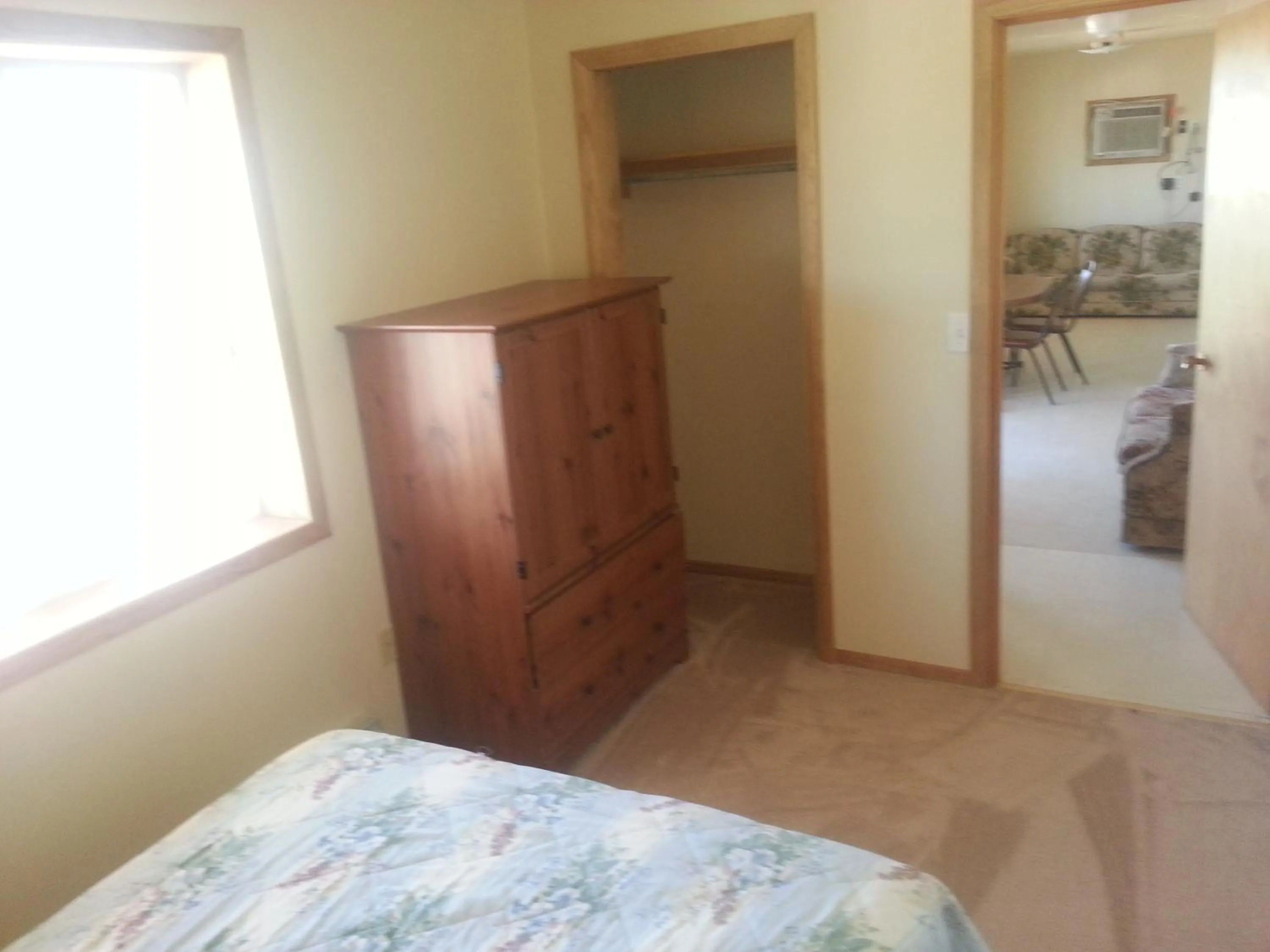 Day, Bed in Badlands Hotel & Campground