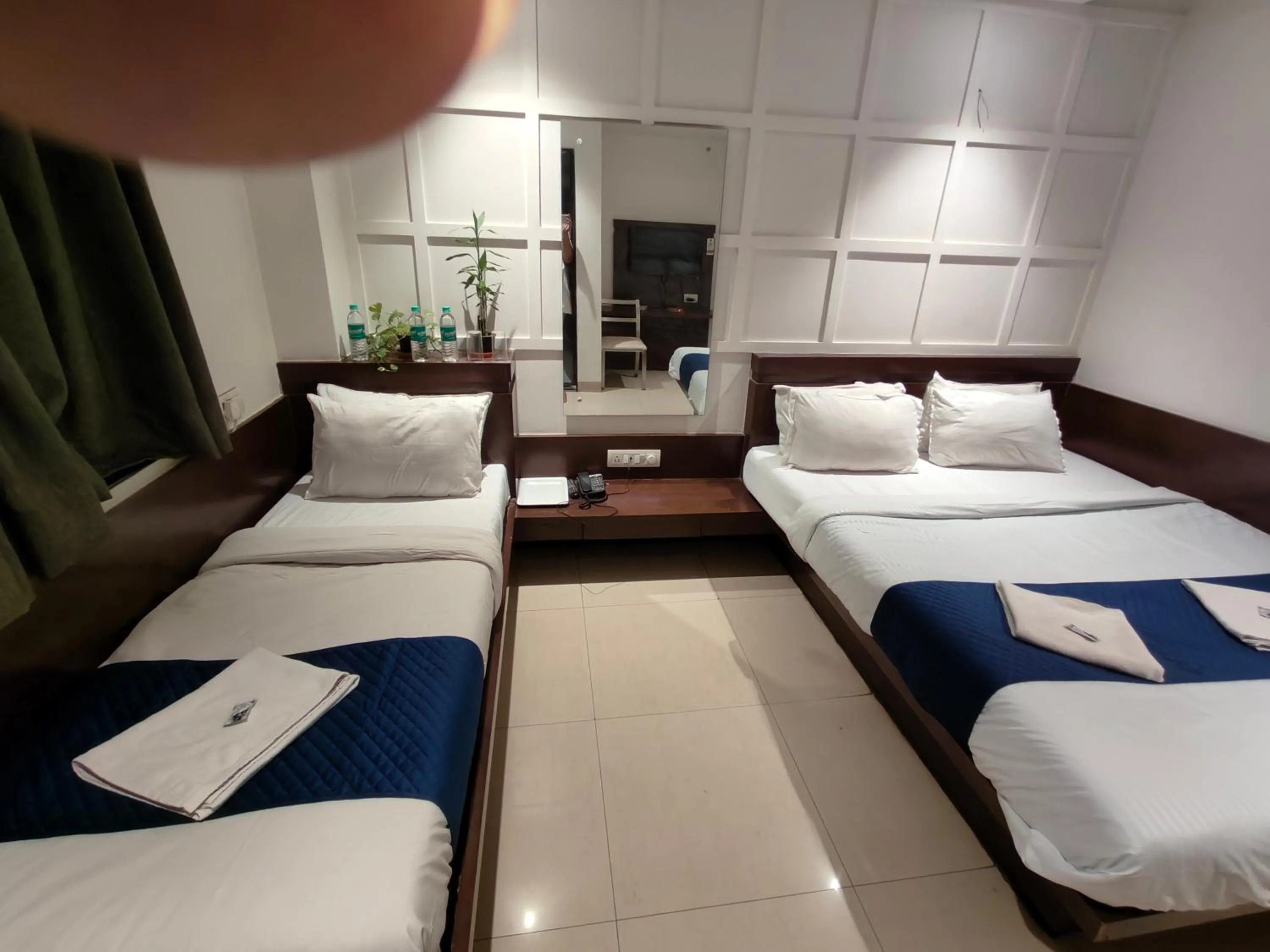 Bed in Hotel Anand Palace