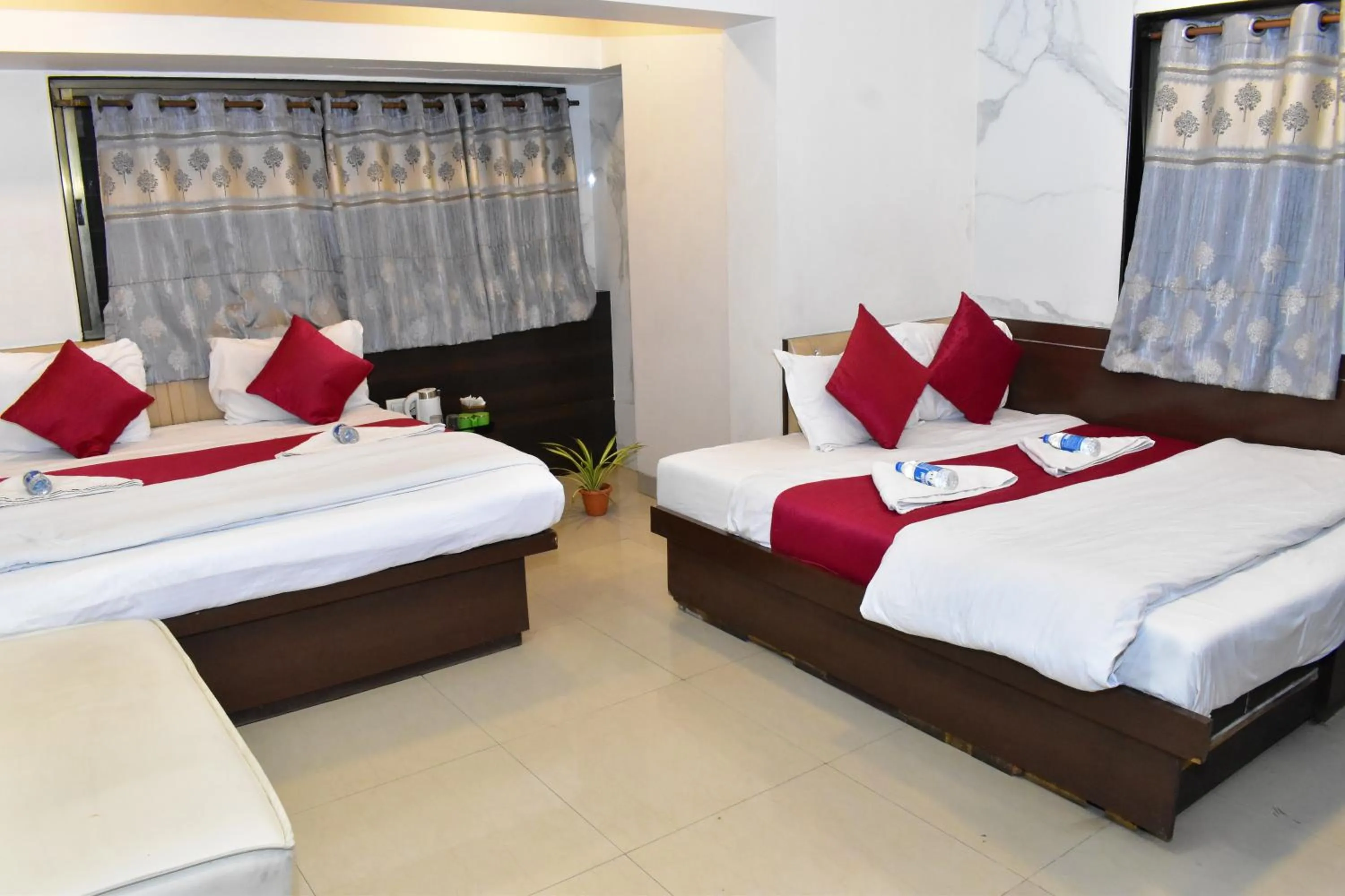 Bed in Hotel Anand Palace