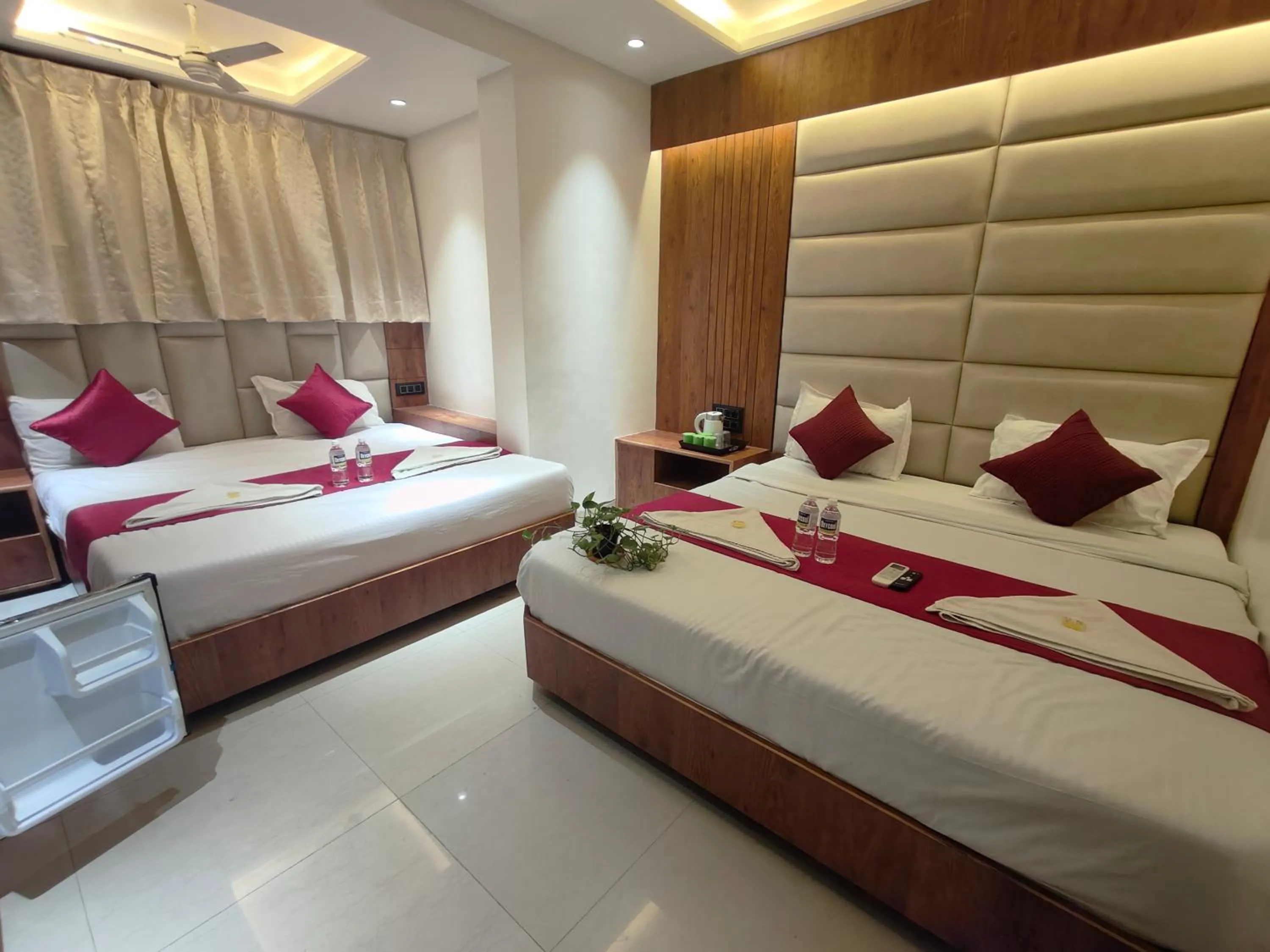 Bed in Hotel Anand Palace