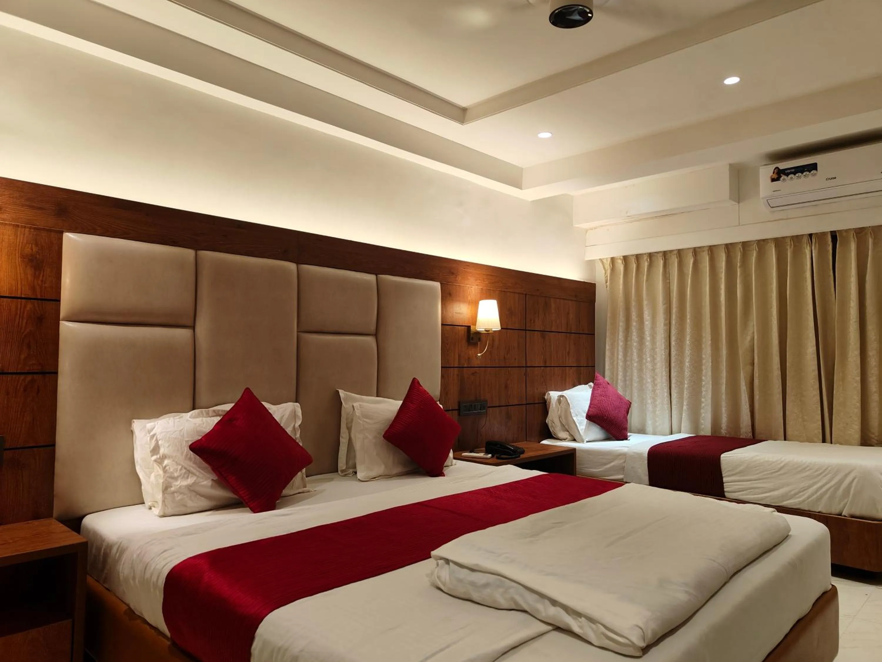 Bed in Hotel Anand Palace