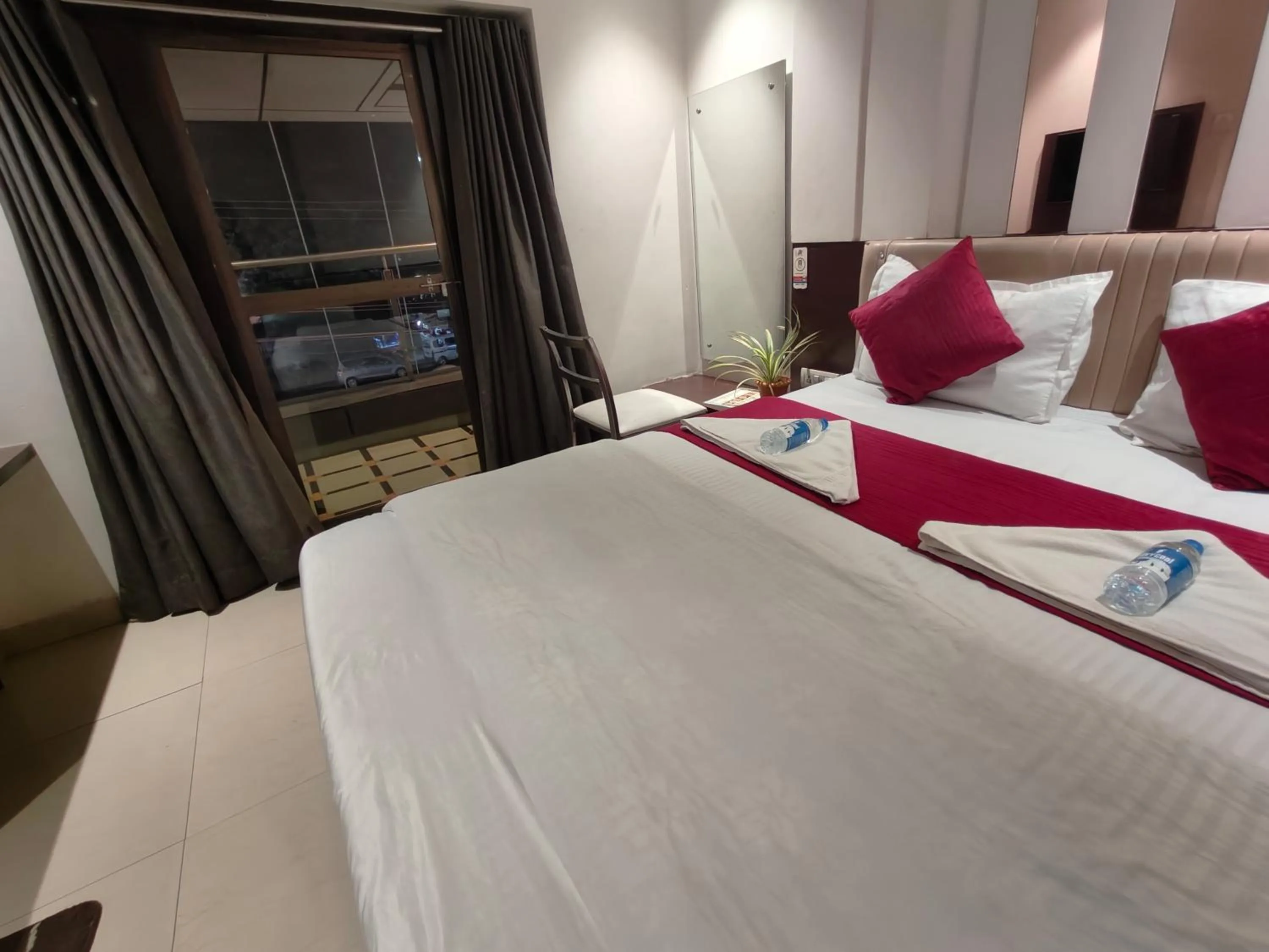 Bed in Hotel Anand Palace