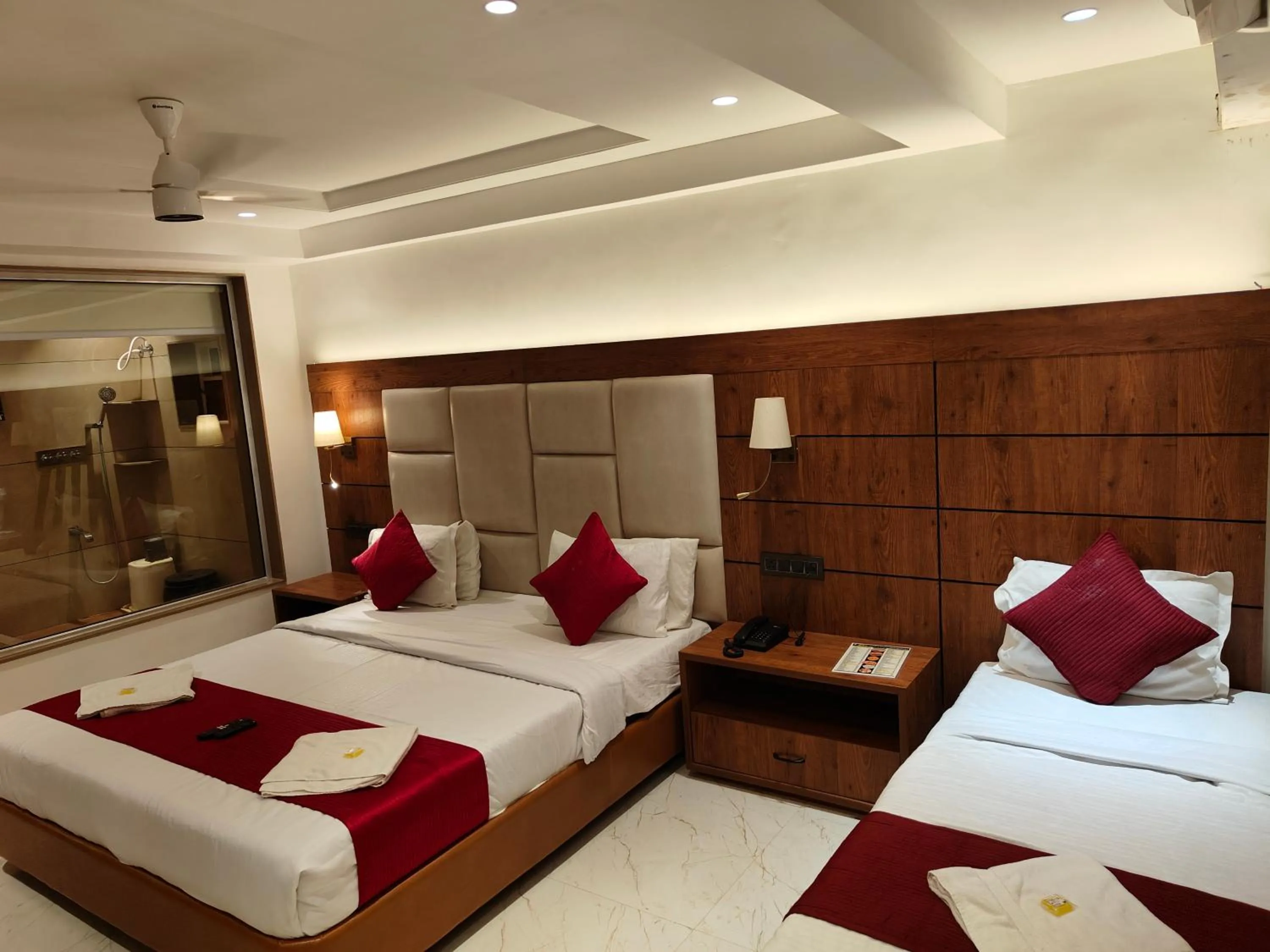 Bed in Hotel Anand Palace