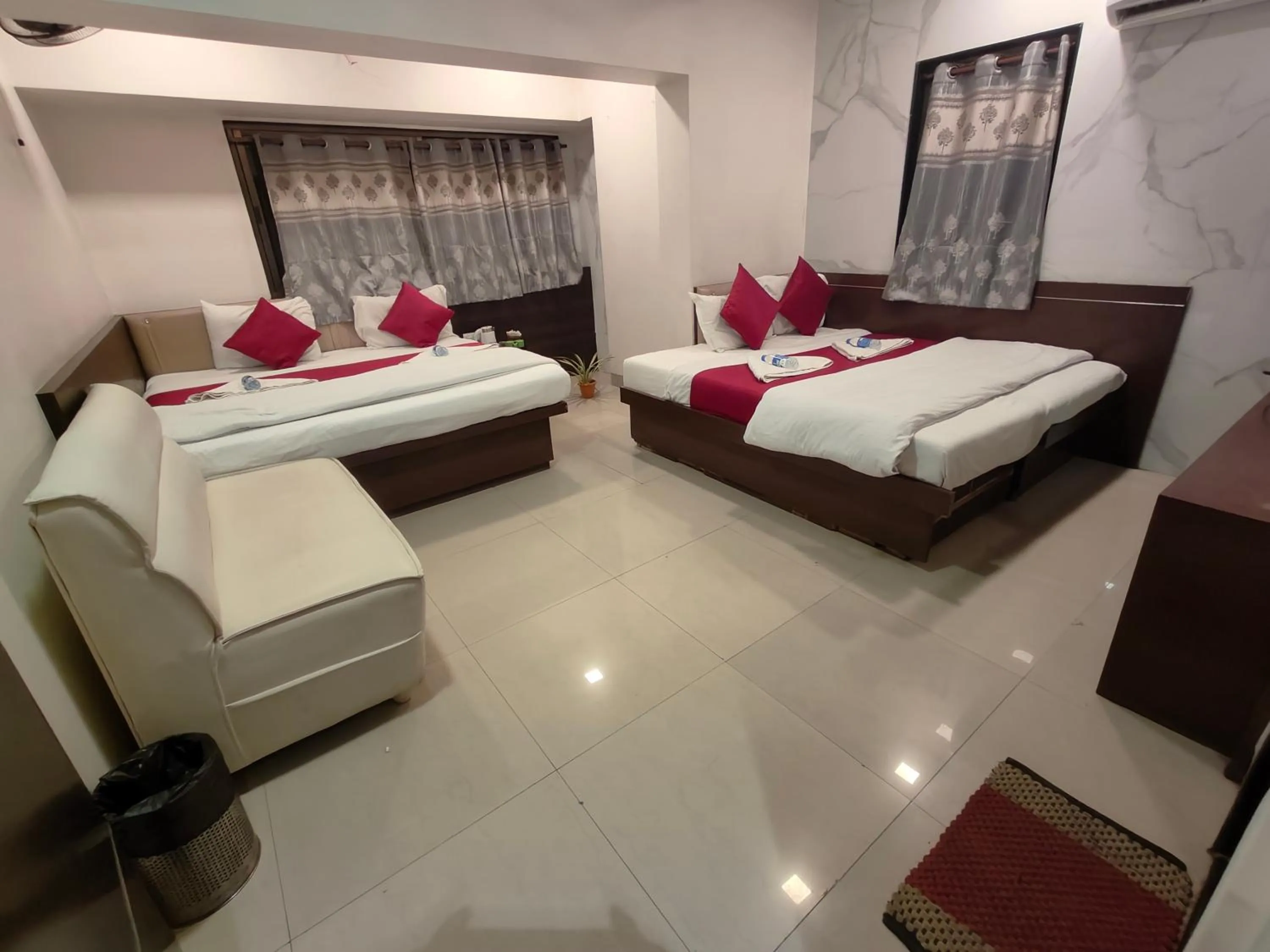 Bed in Hotel Anand Palace