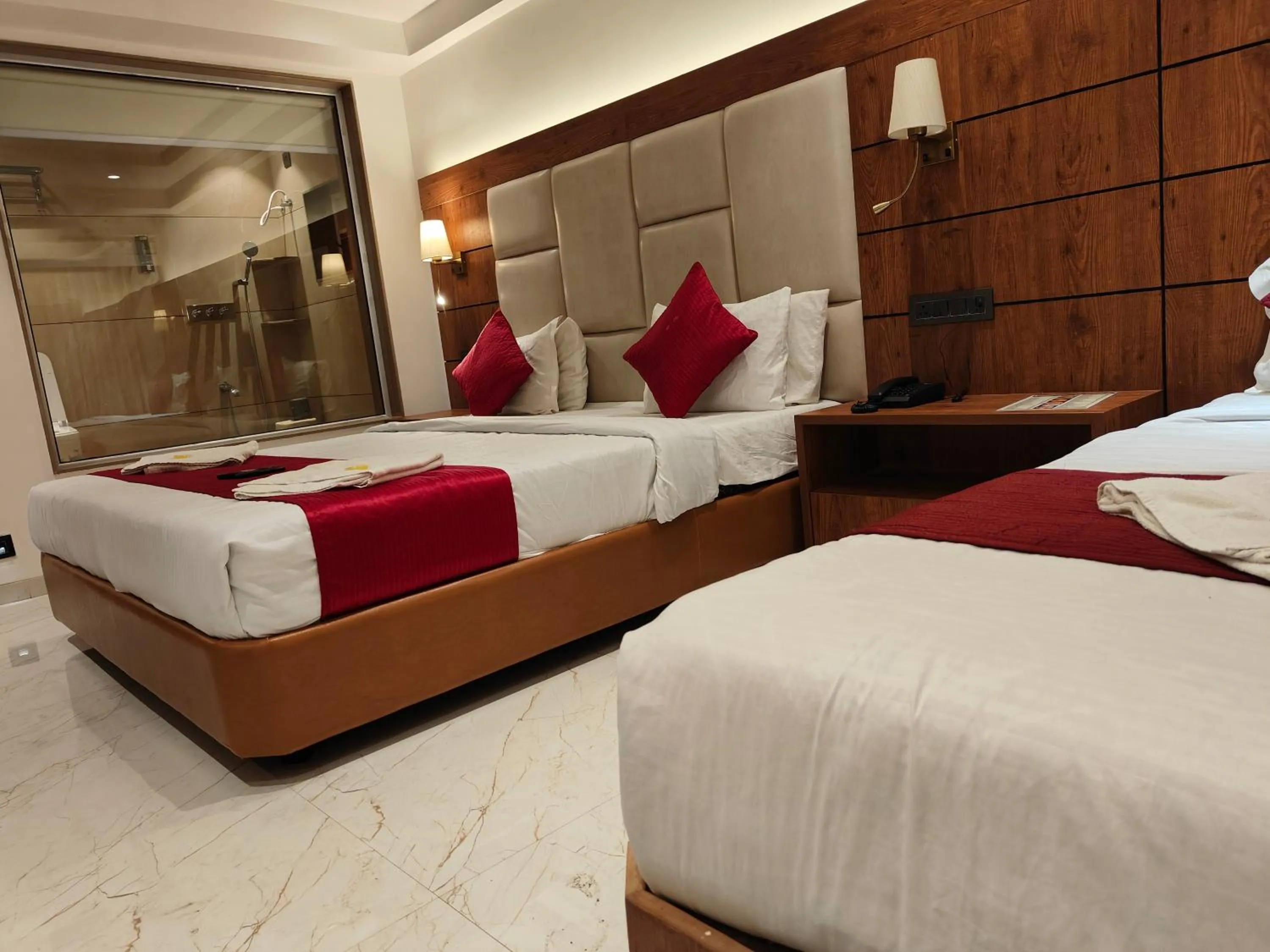 Bed in Hotel Anand Palace