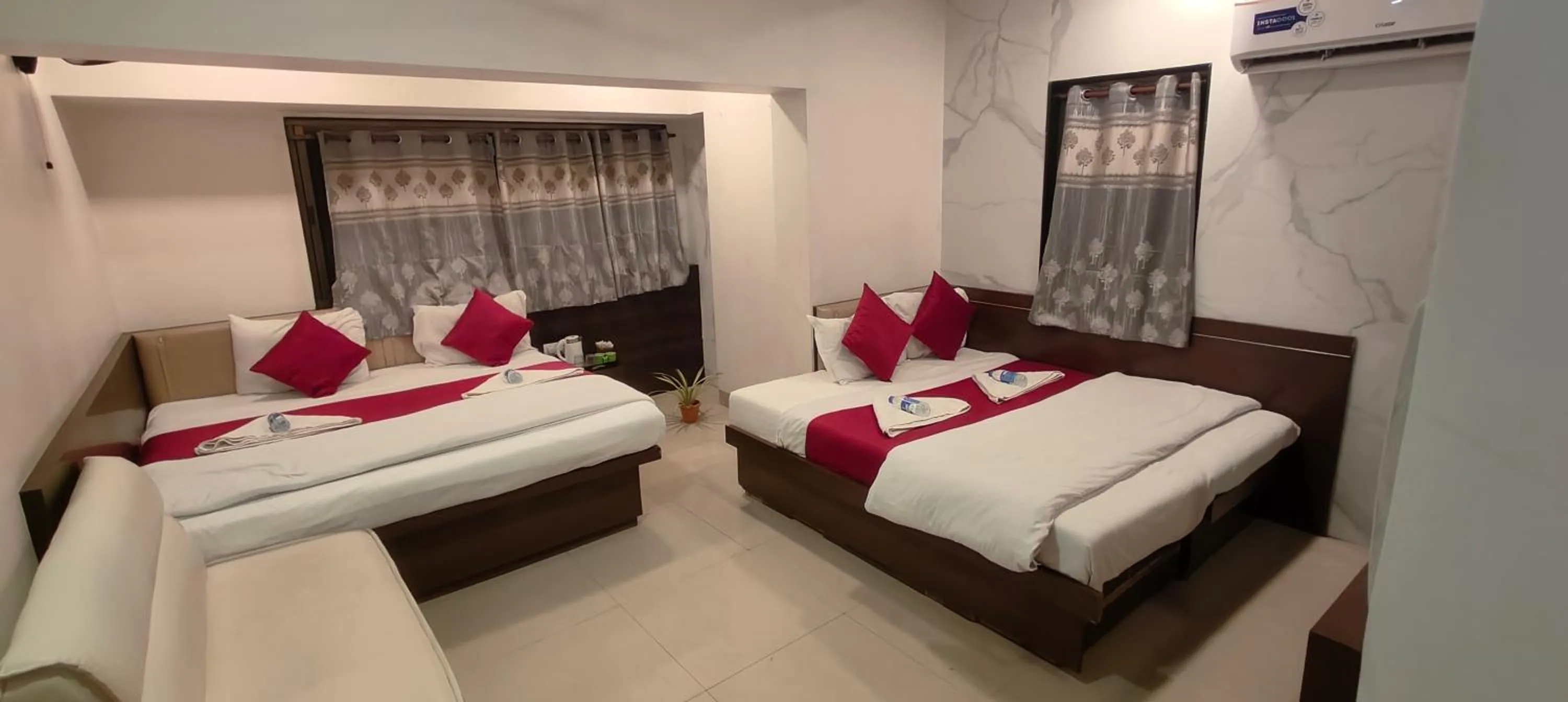 Bed in Hotel Anand Palace