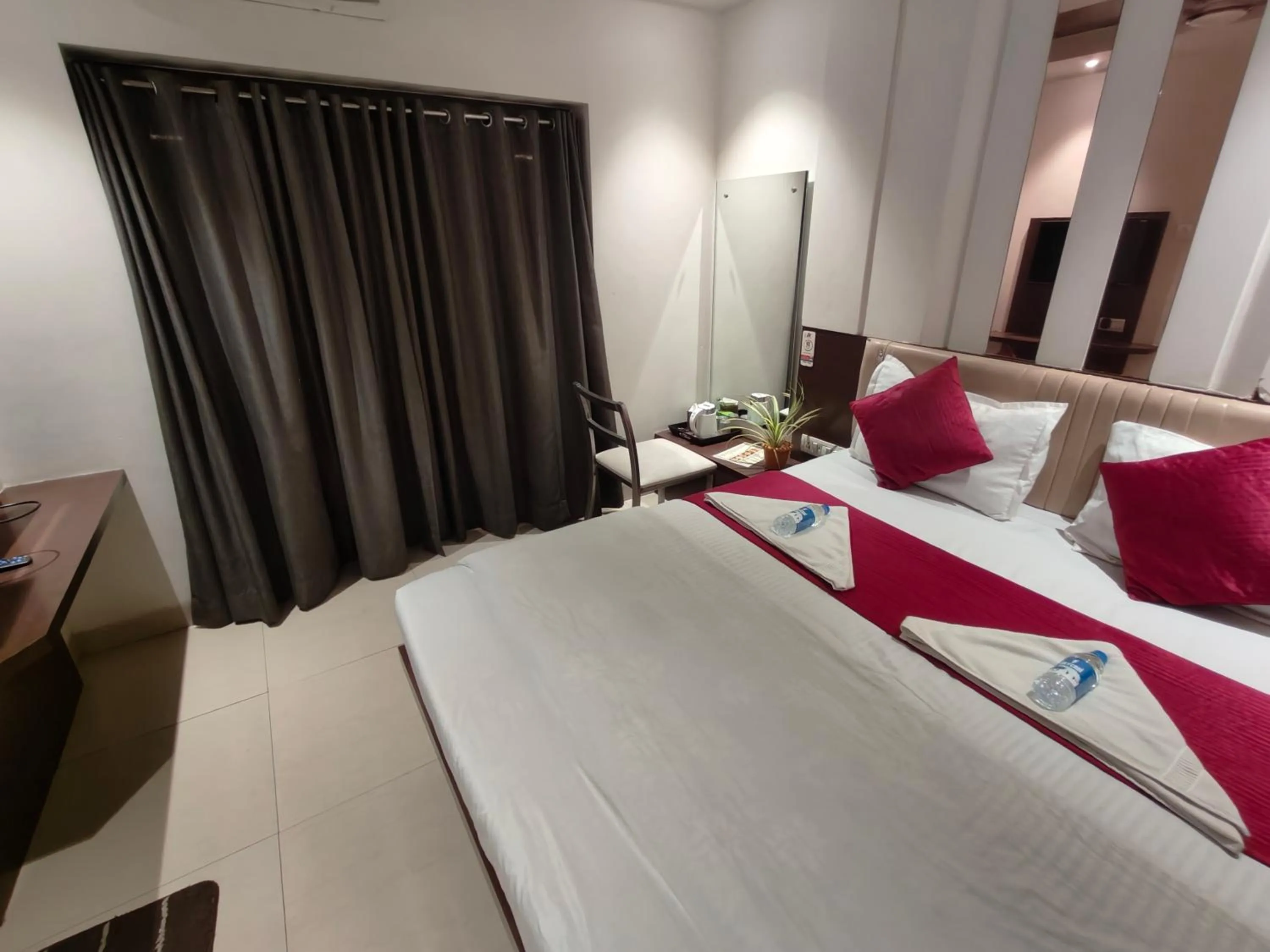 Bed in Hotel Anand Palace