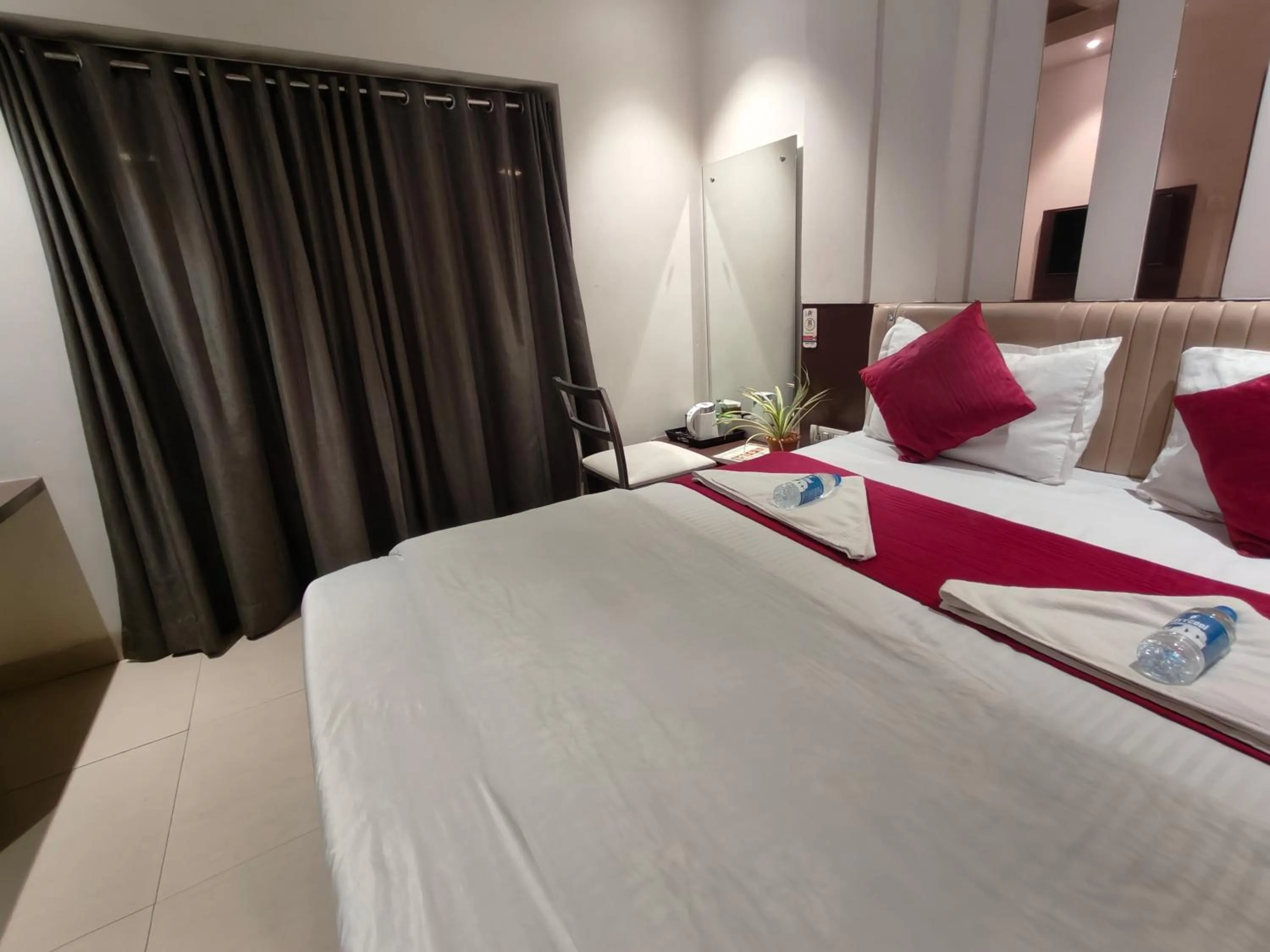 Bed in Hotel Anand Palace