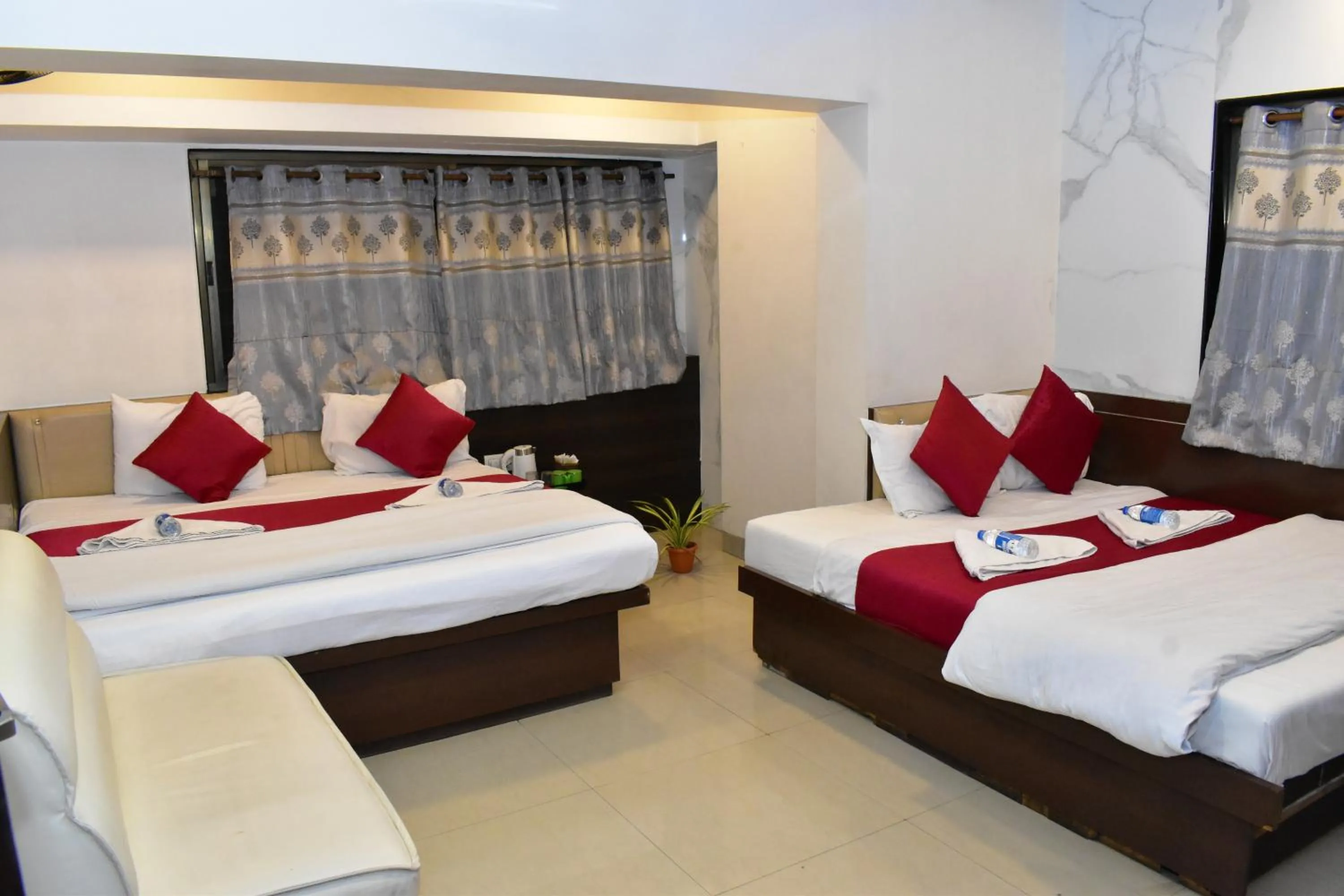 Bed in Hotel Anand Palace