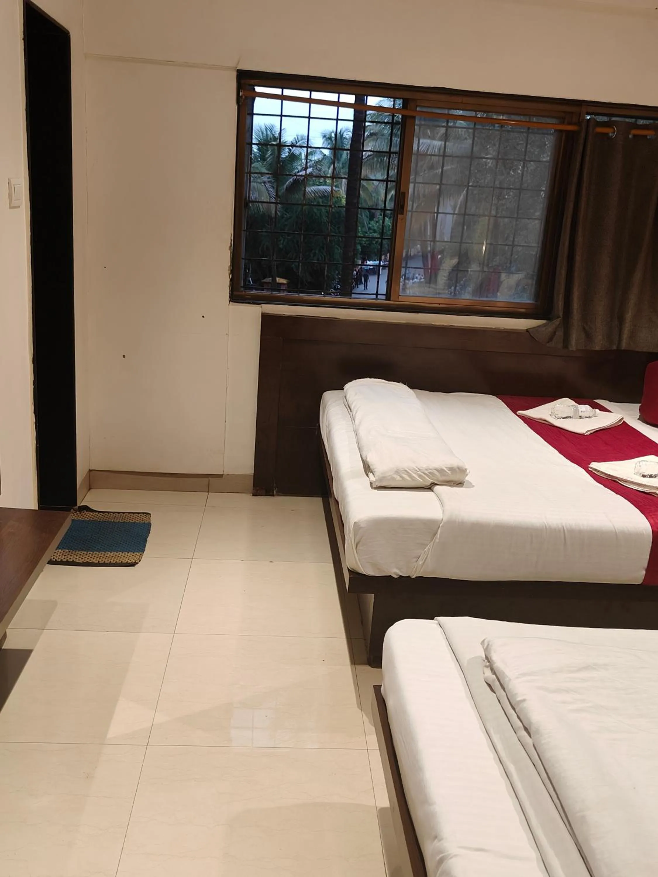 View (from property/room), Bed in Hotel Anand Palace