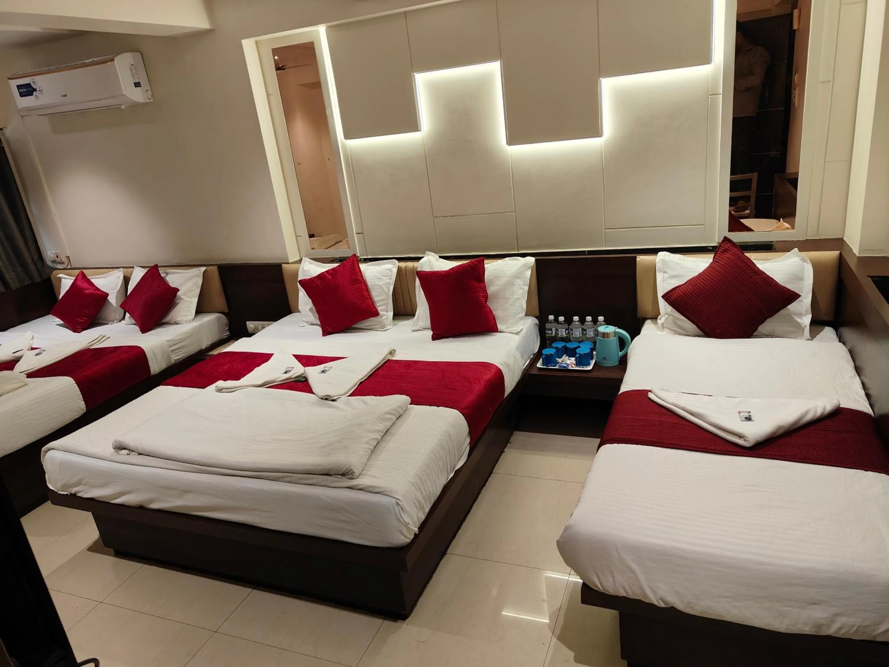 Bed in Hotel Anand Palace