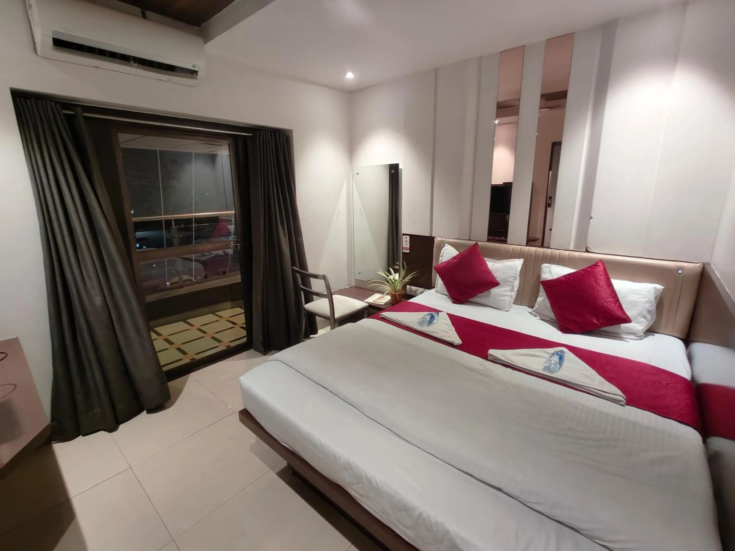 Bed in Hotel Anand Palace