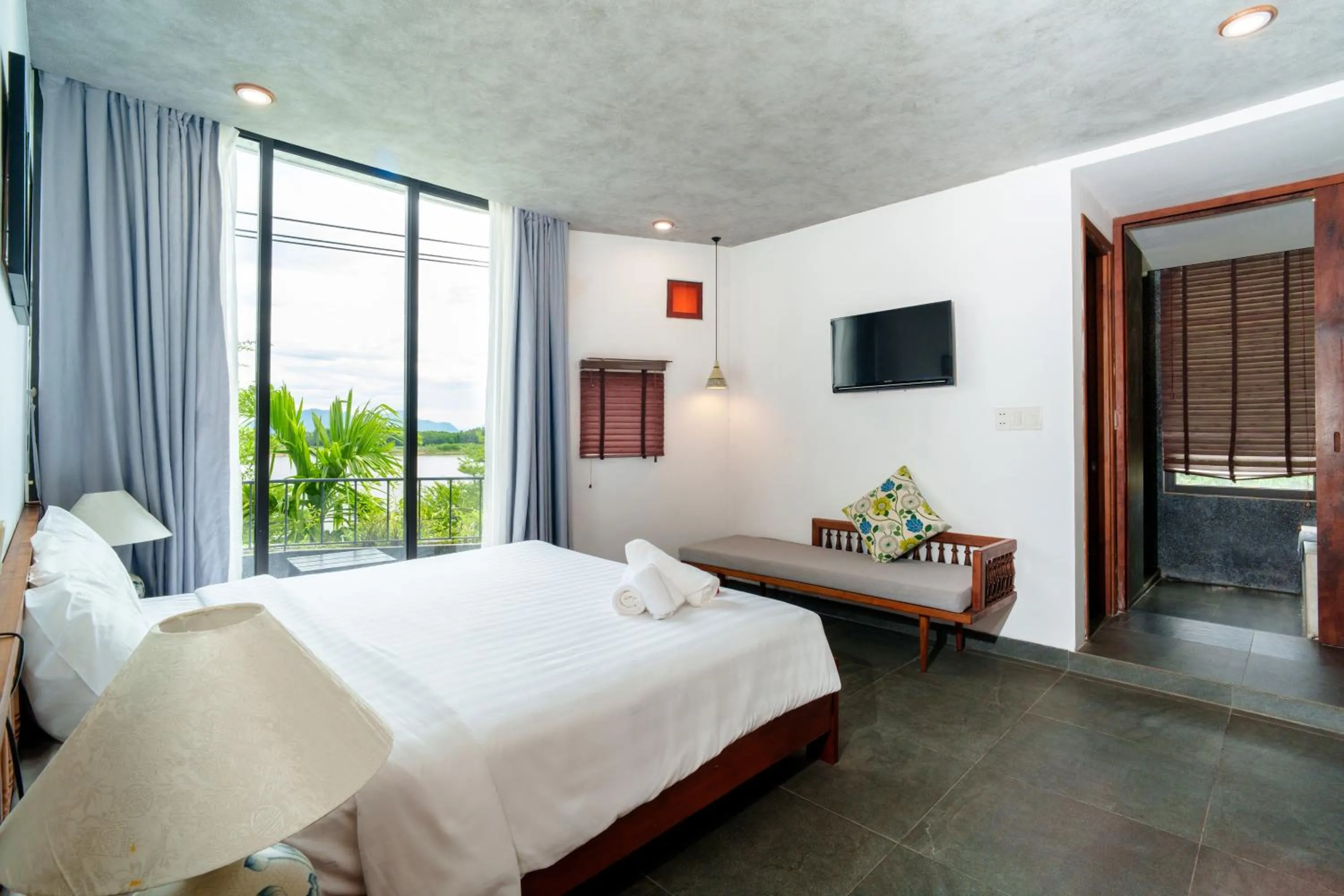 Bed in Serene Riverside Hotel Hoi An