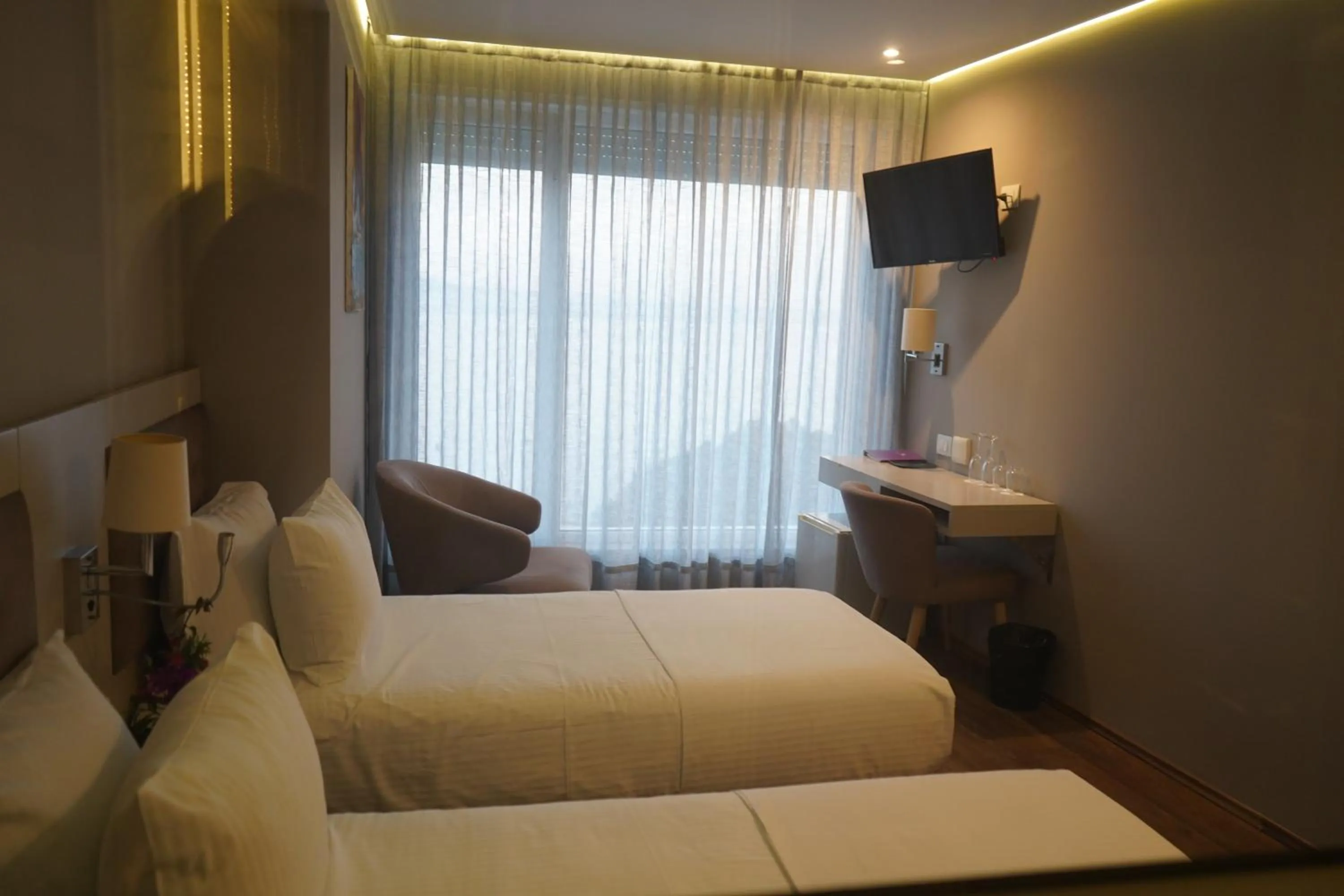 Bed in Bougainville Bay Hotel