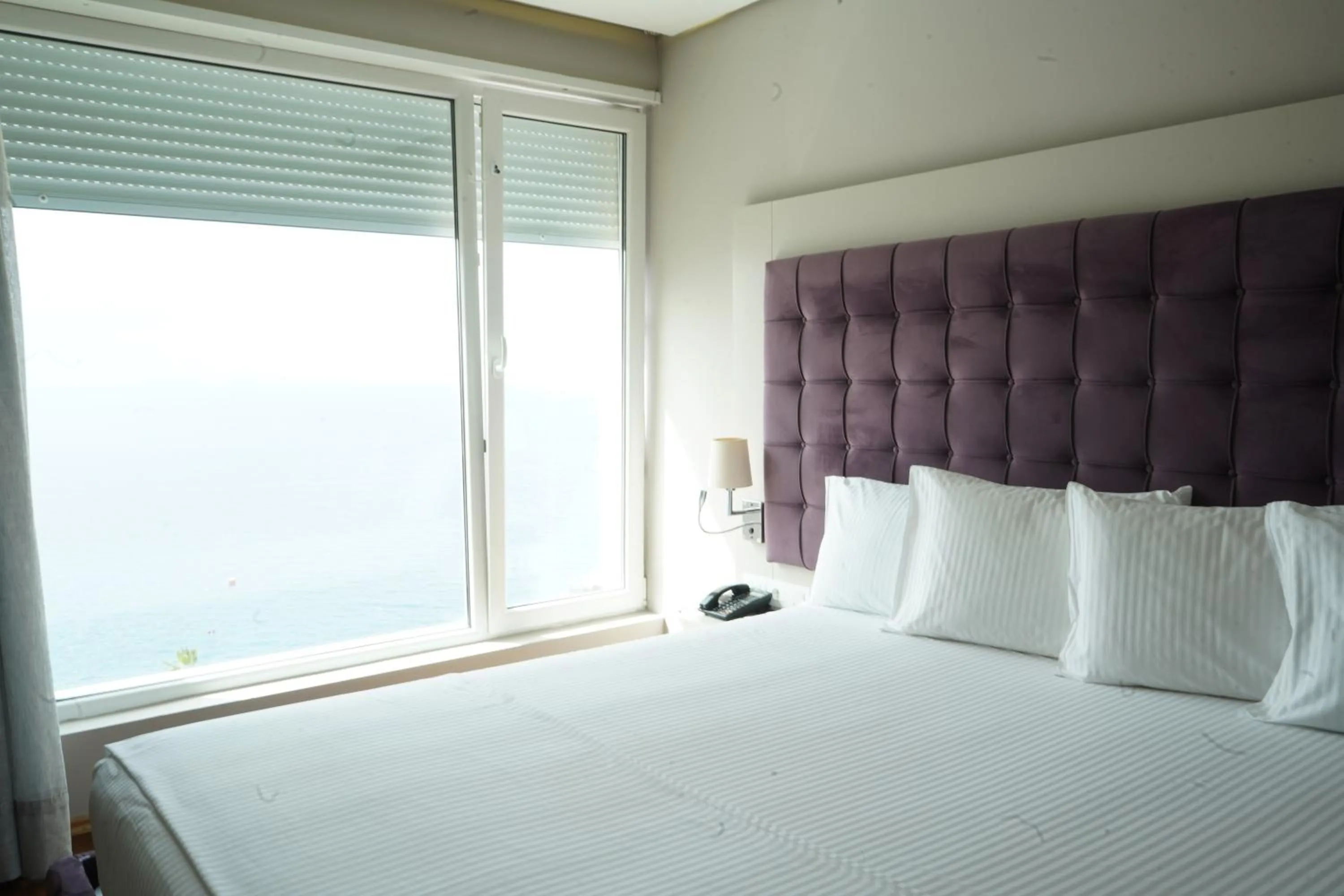 Bed in Bougainville Bay Hotel