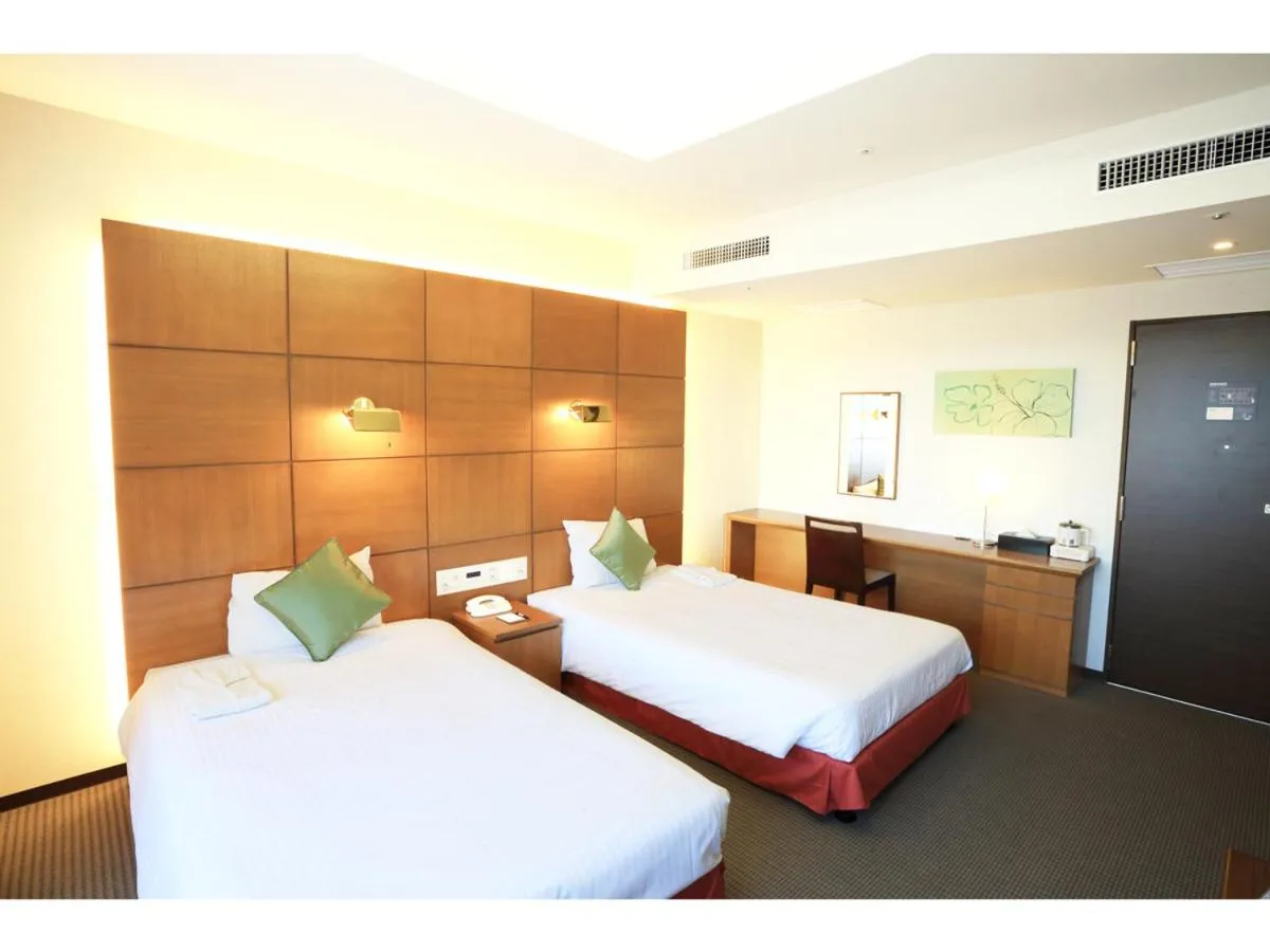 Photo of the whole room, Bed in Smile Hotel Naha City Resort