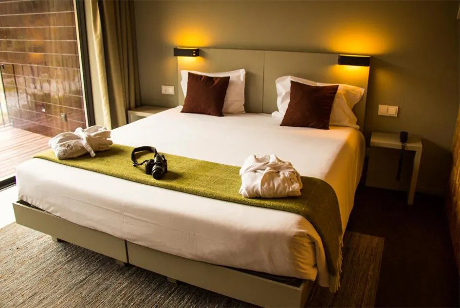 Bed in Longroiva Hotel Rural