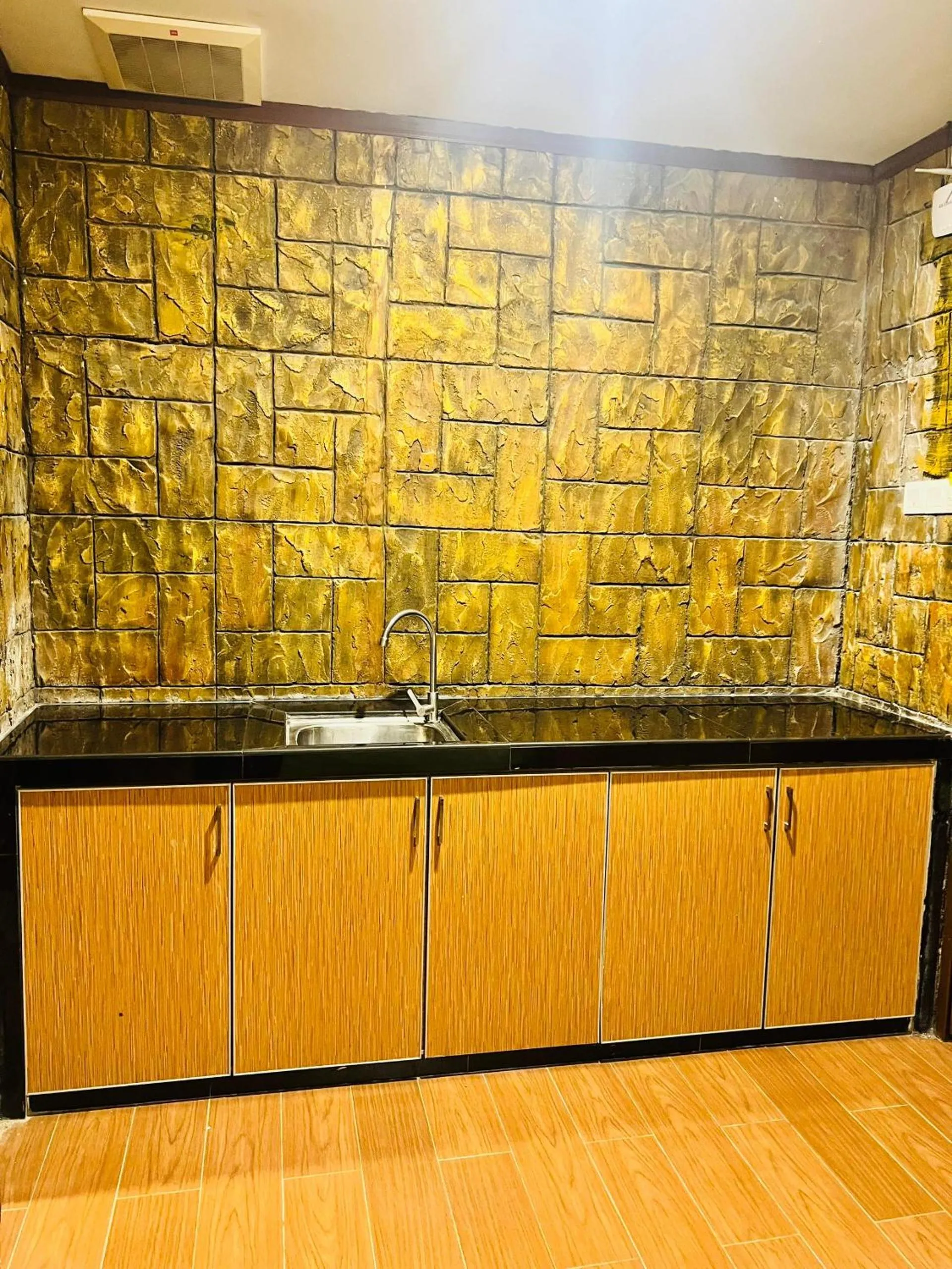 Kitchen or kitchenette in K Garden Hotel Sungai Petani