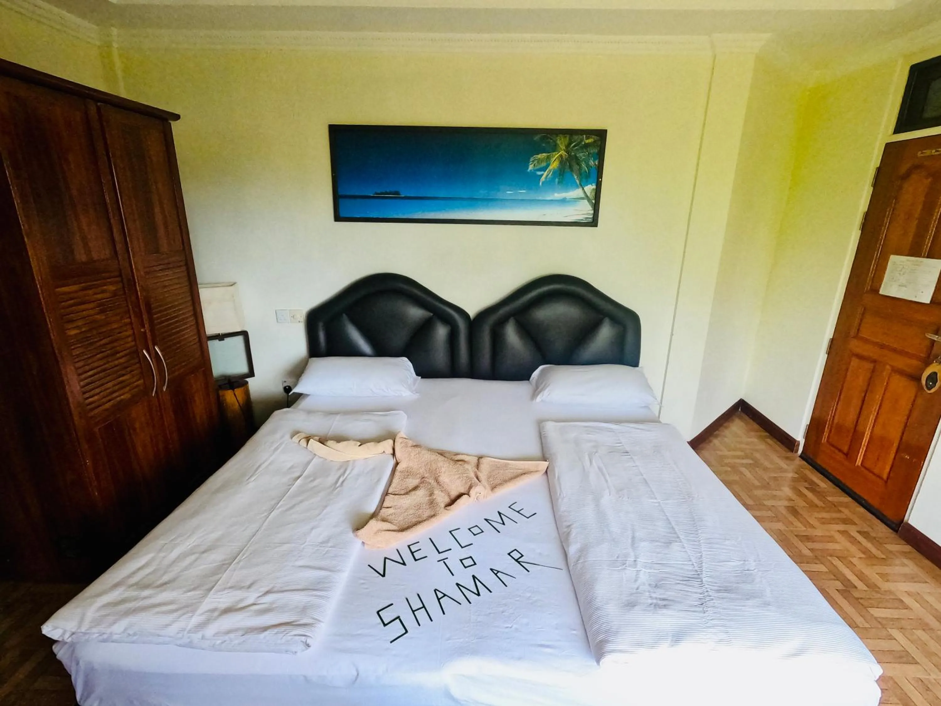 Bed in Shamar Guesthouse & Dive