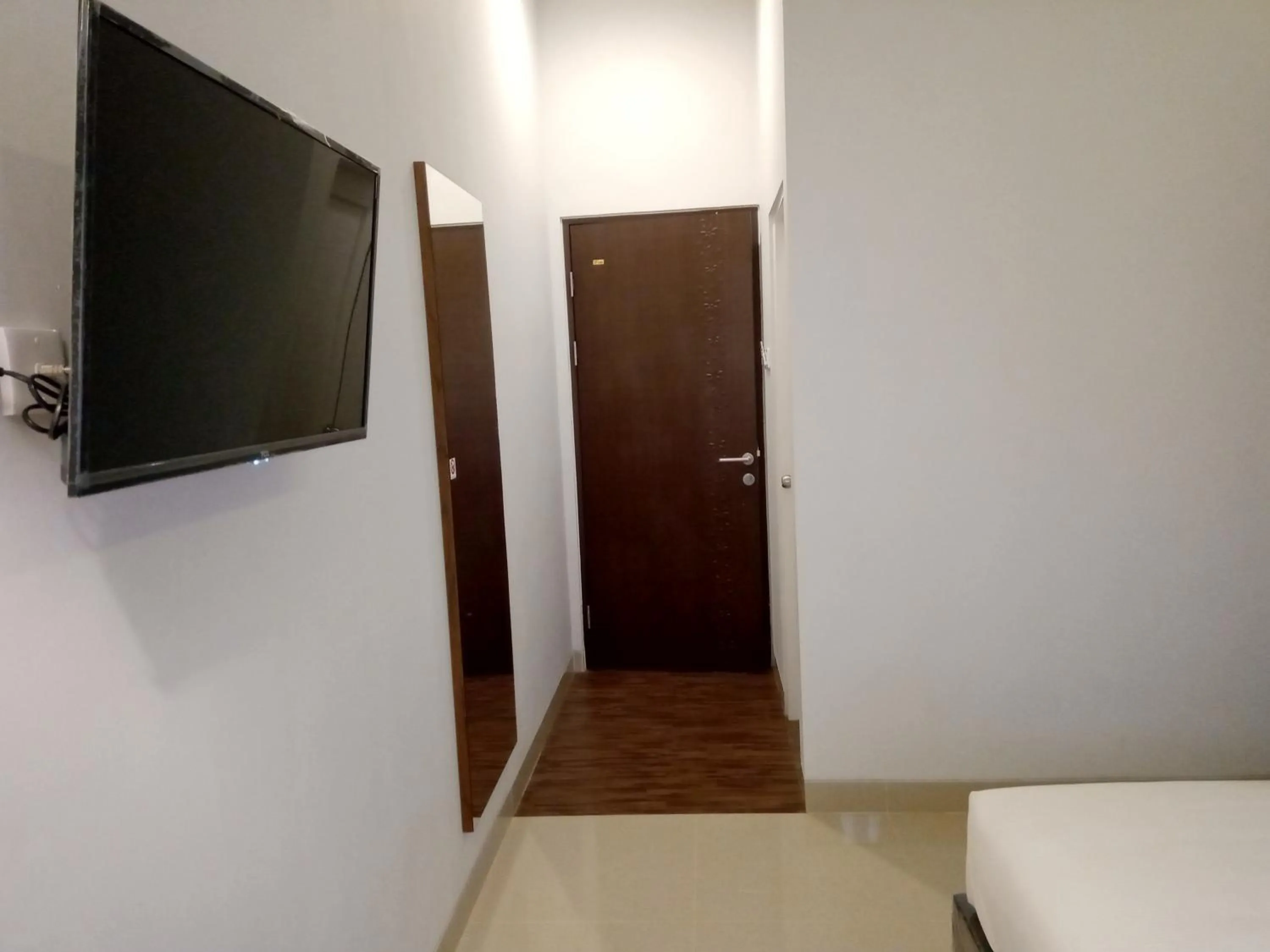 TV and multimedia, Bed in Alzara Hotel Syariah