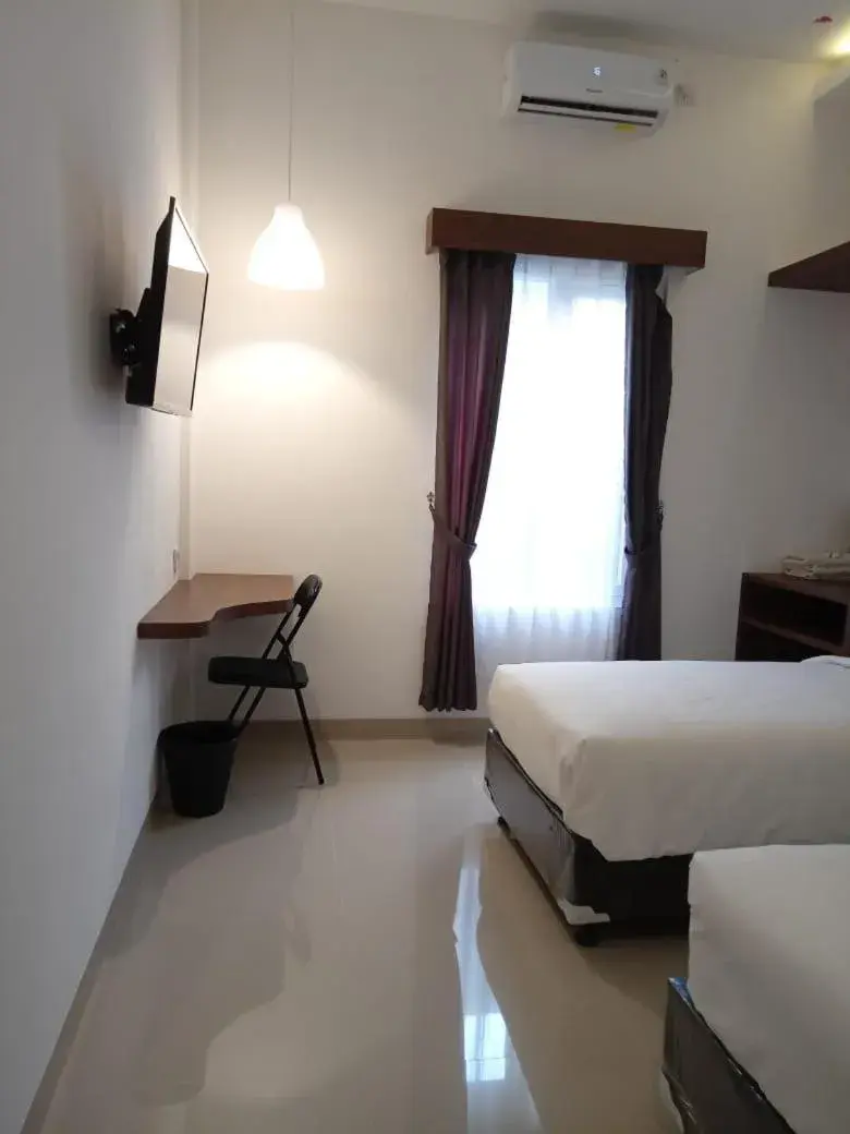 Bed in Alzara Hotel Syariah Bed in Alzara Hotel Syariah