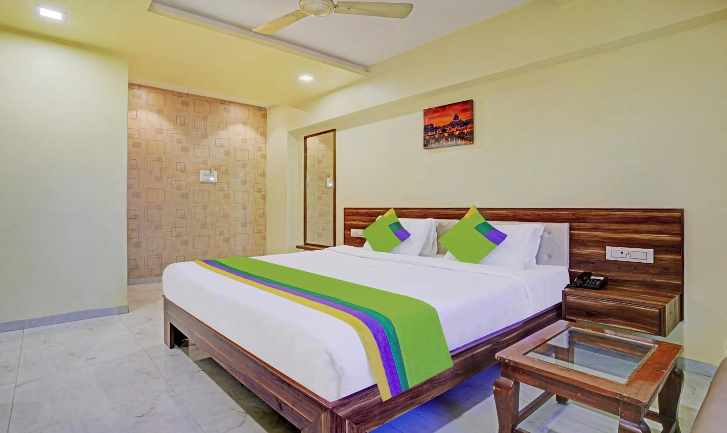 Bedroom, Bed in Treebo De Grandeur Anand Nagar