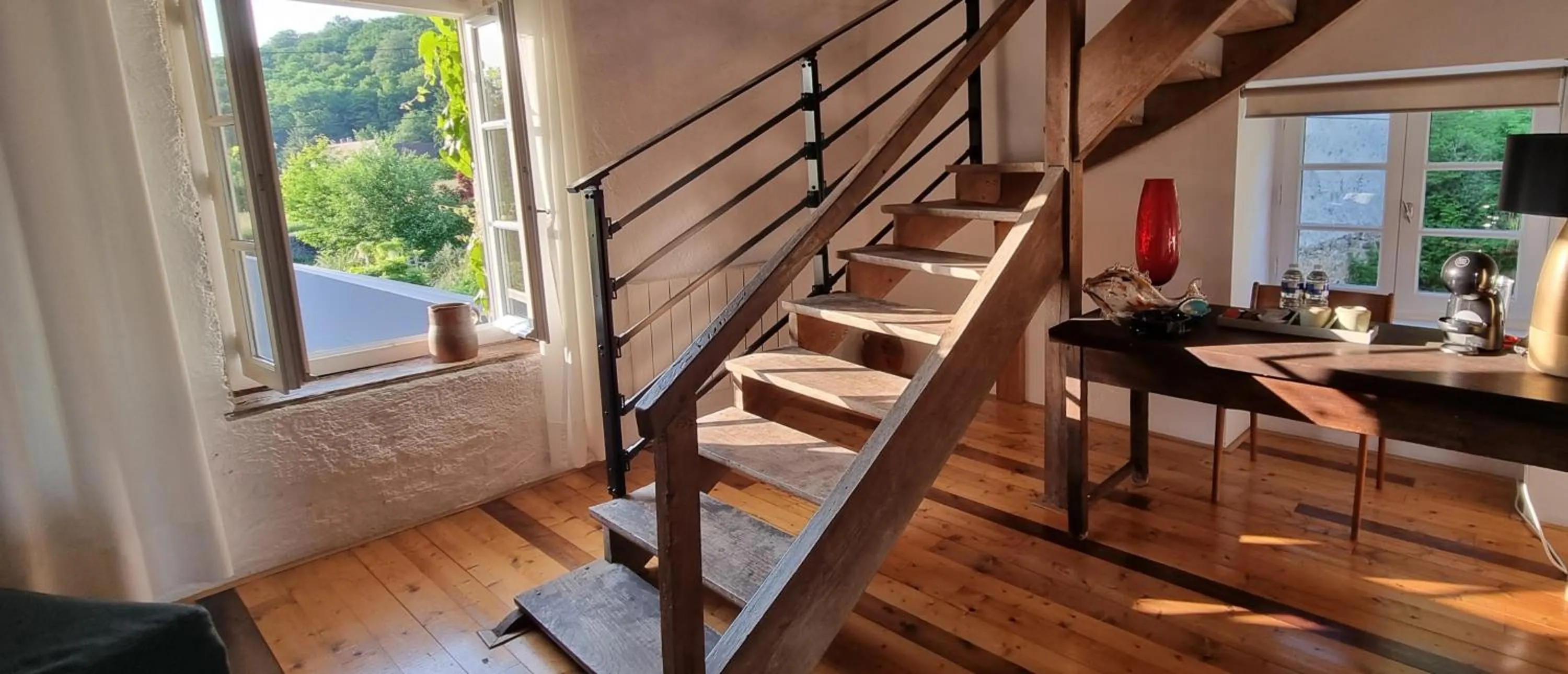 Photo of the whole room in Moulin Renaudiots - Escapade Luxe Refuge cosy & Bourgogne au coin du feu