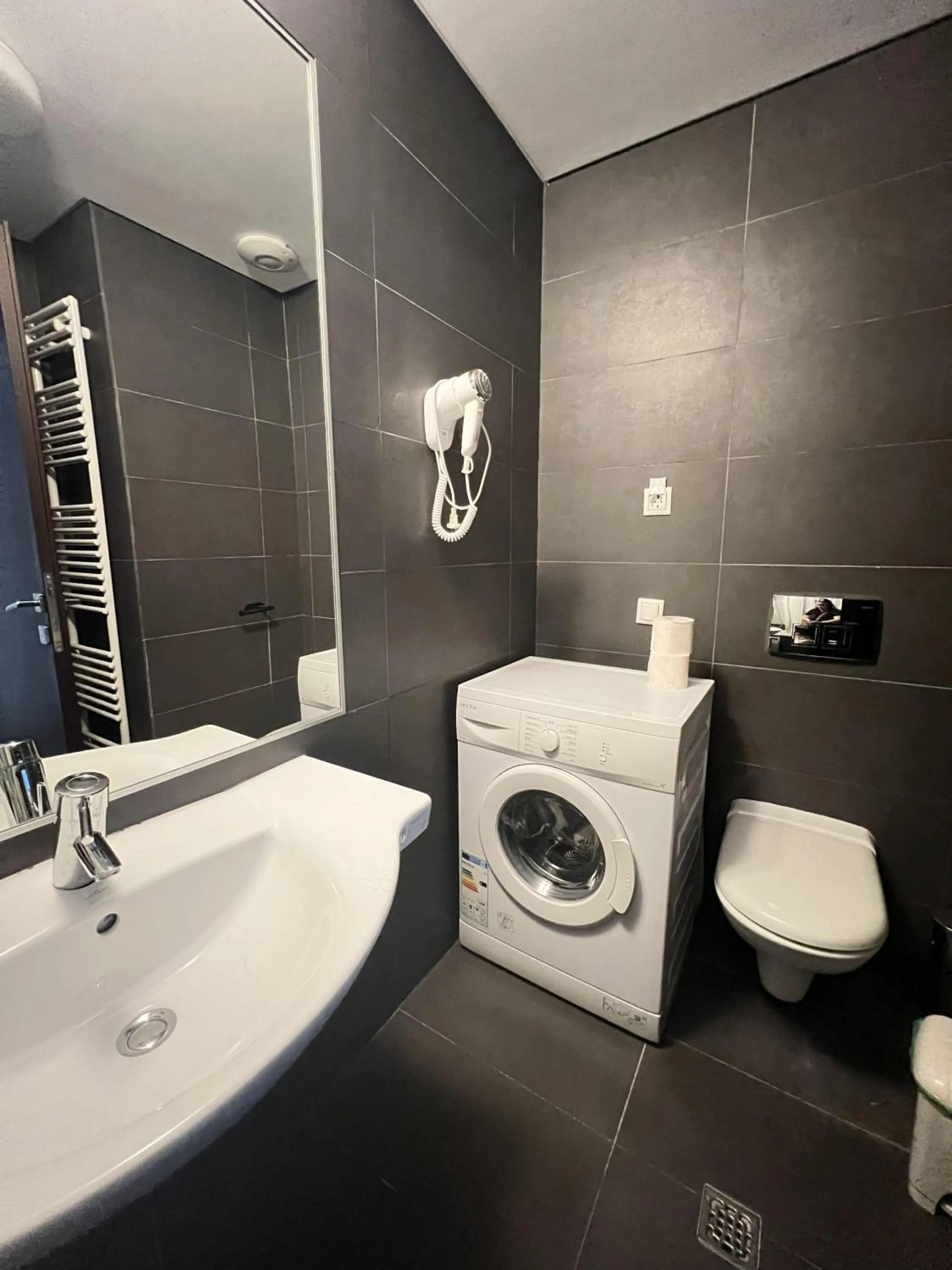 Toilet in Upground Residence Apartments