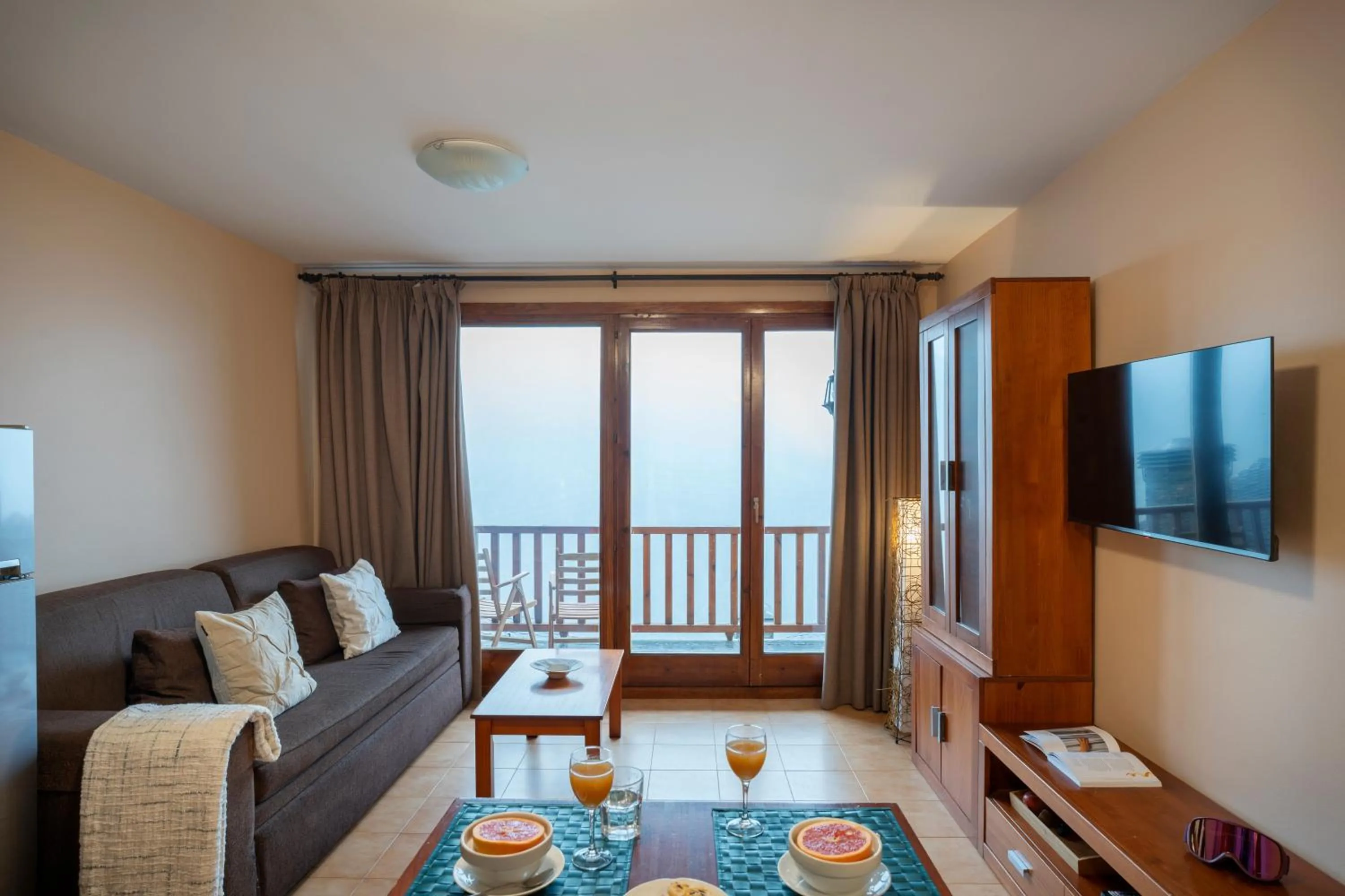 TV and multimedia in Apartamentos Ona Dorada el Tarter