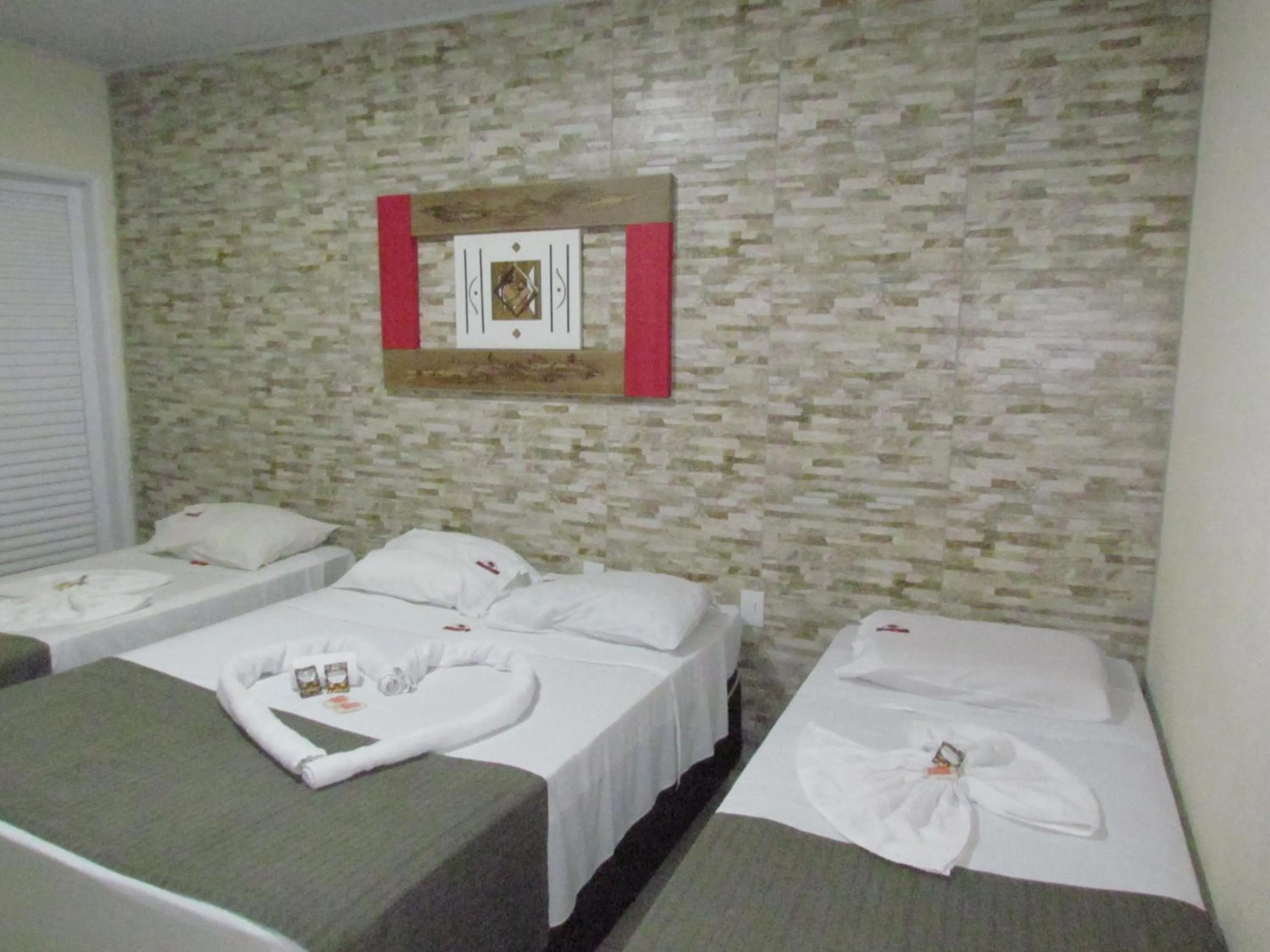 Bed in Pousada Quinta Das Aroeiras
