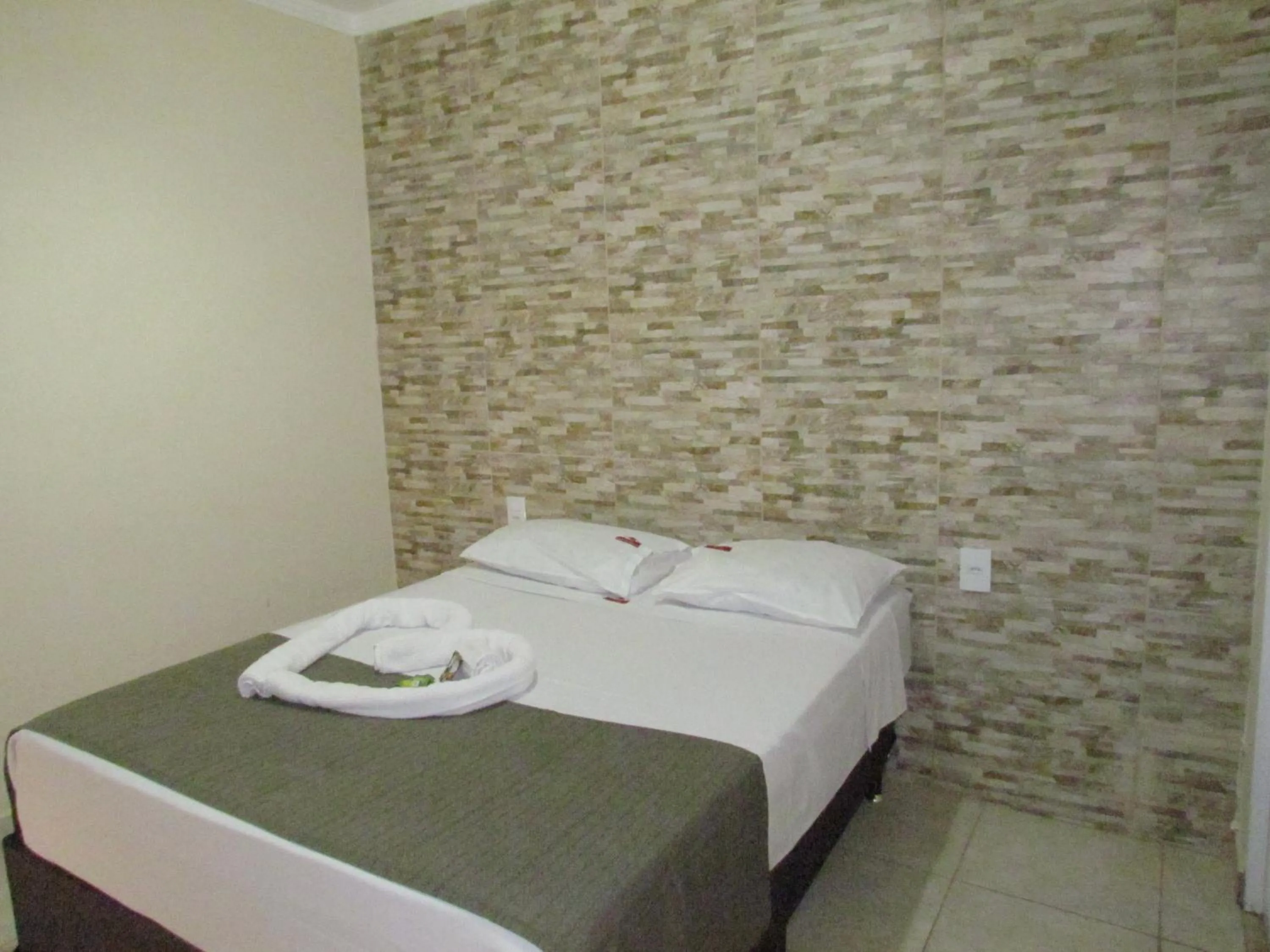 Bed in Pousada Quinta Das Aroeiras